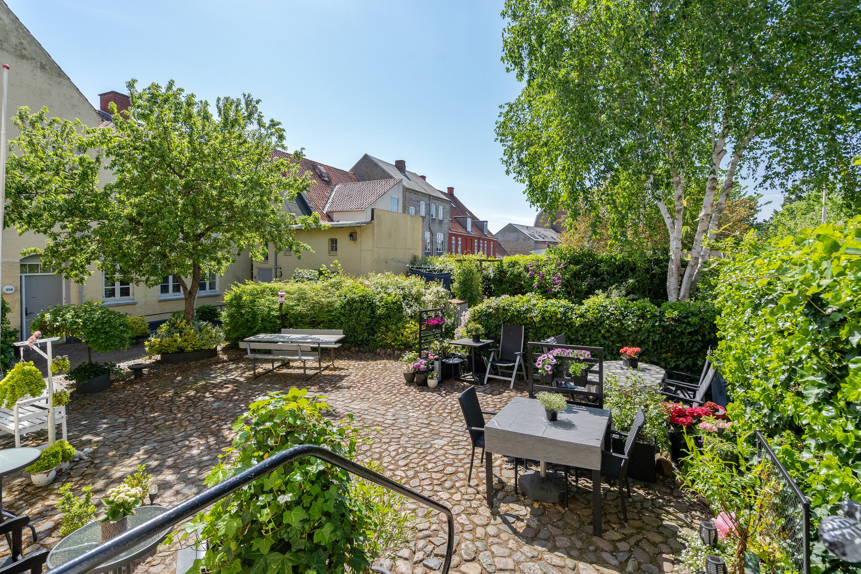 Fremhævet baggård billede i fuldskærmstilstand. Billede af Naffet 33D, 1. th., 6100 Haderslev