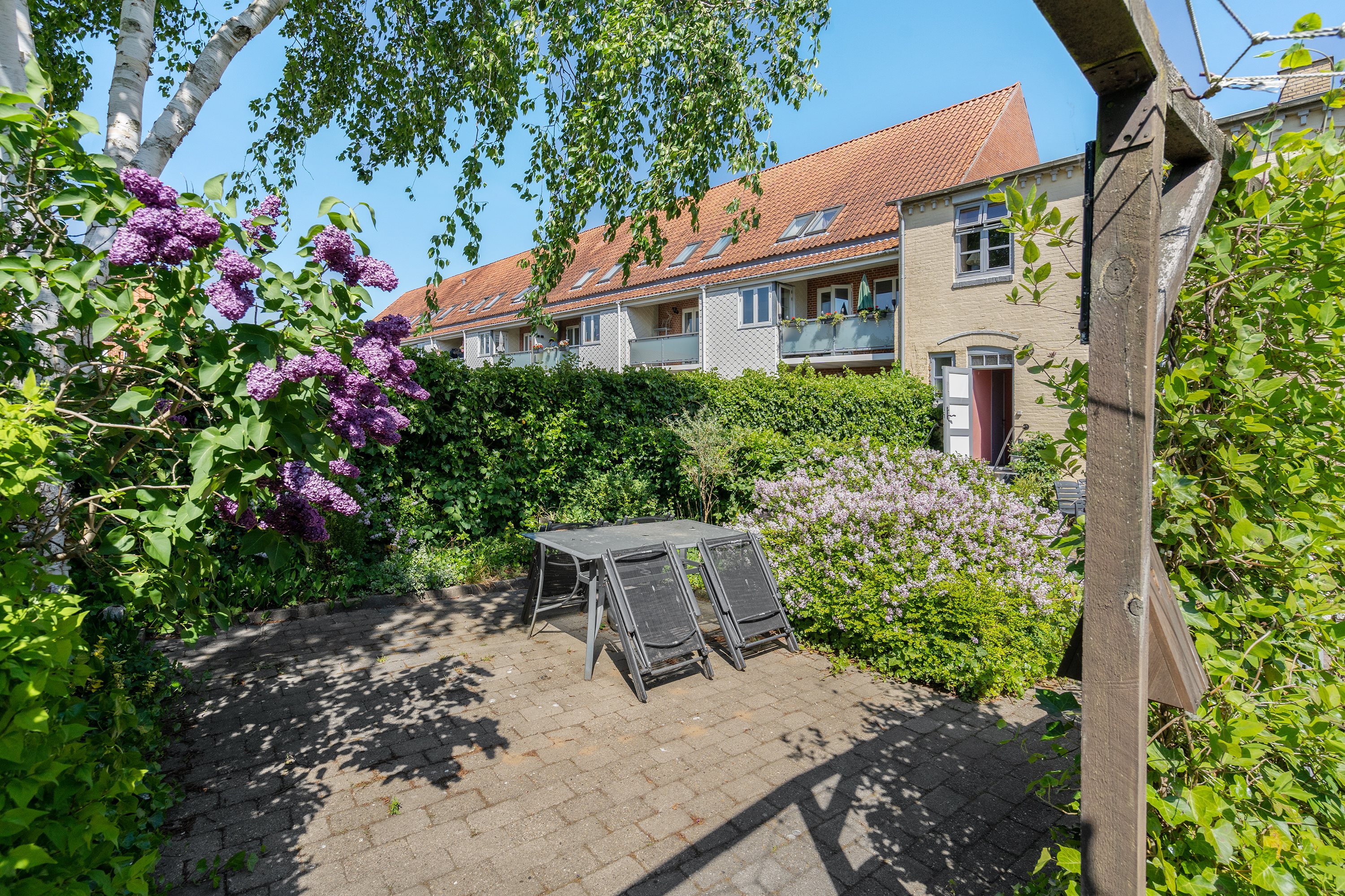 Fremhævet baggård billede i fuldskærmstilstand. Billede af Naffet 33D, 1. th., 6100 Haderslev