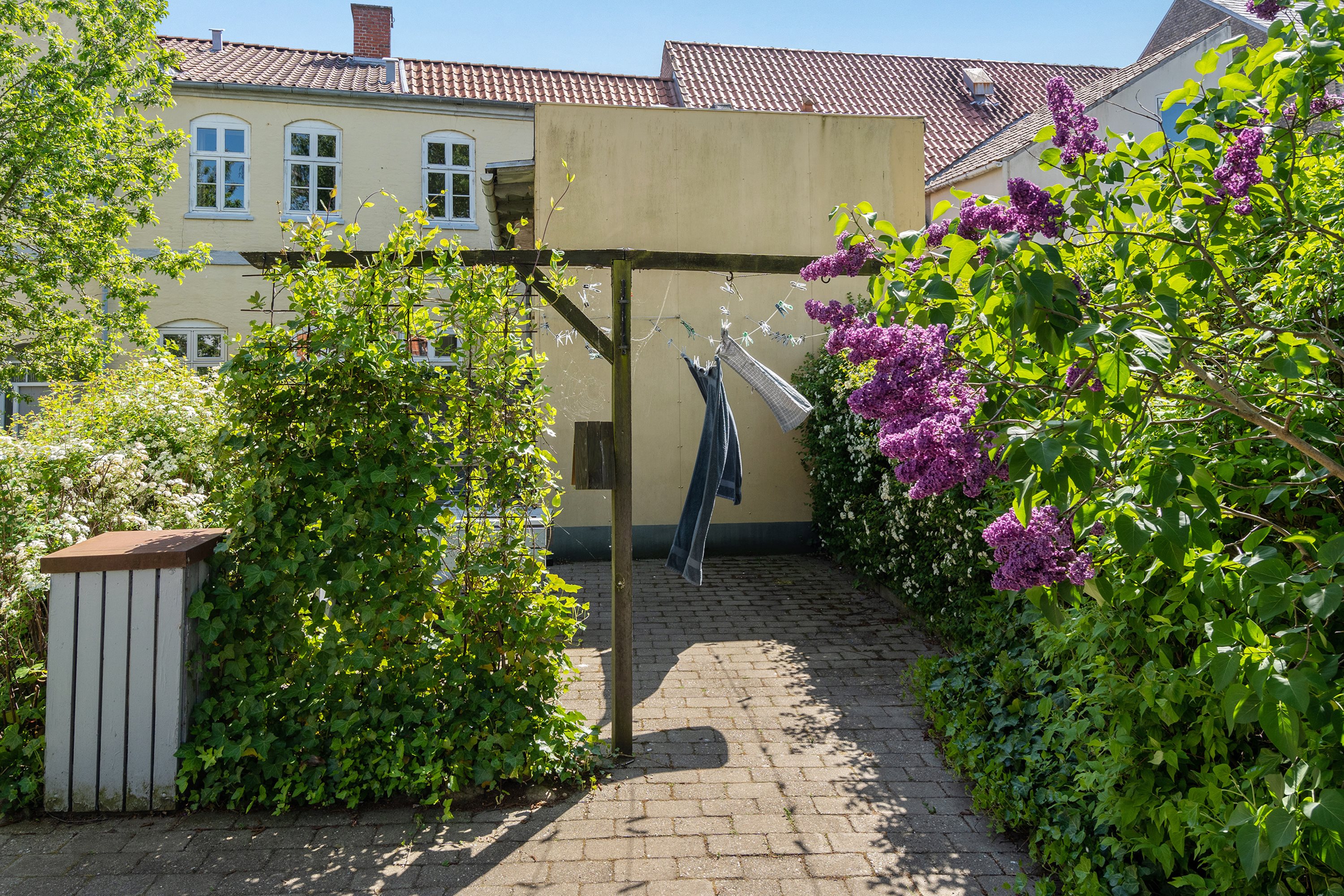 Fremhævet baggård billede i fuldskærmstilstand. Billede af Naffet 33D, 1. th., 6100 Haderslev