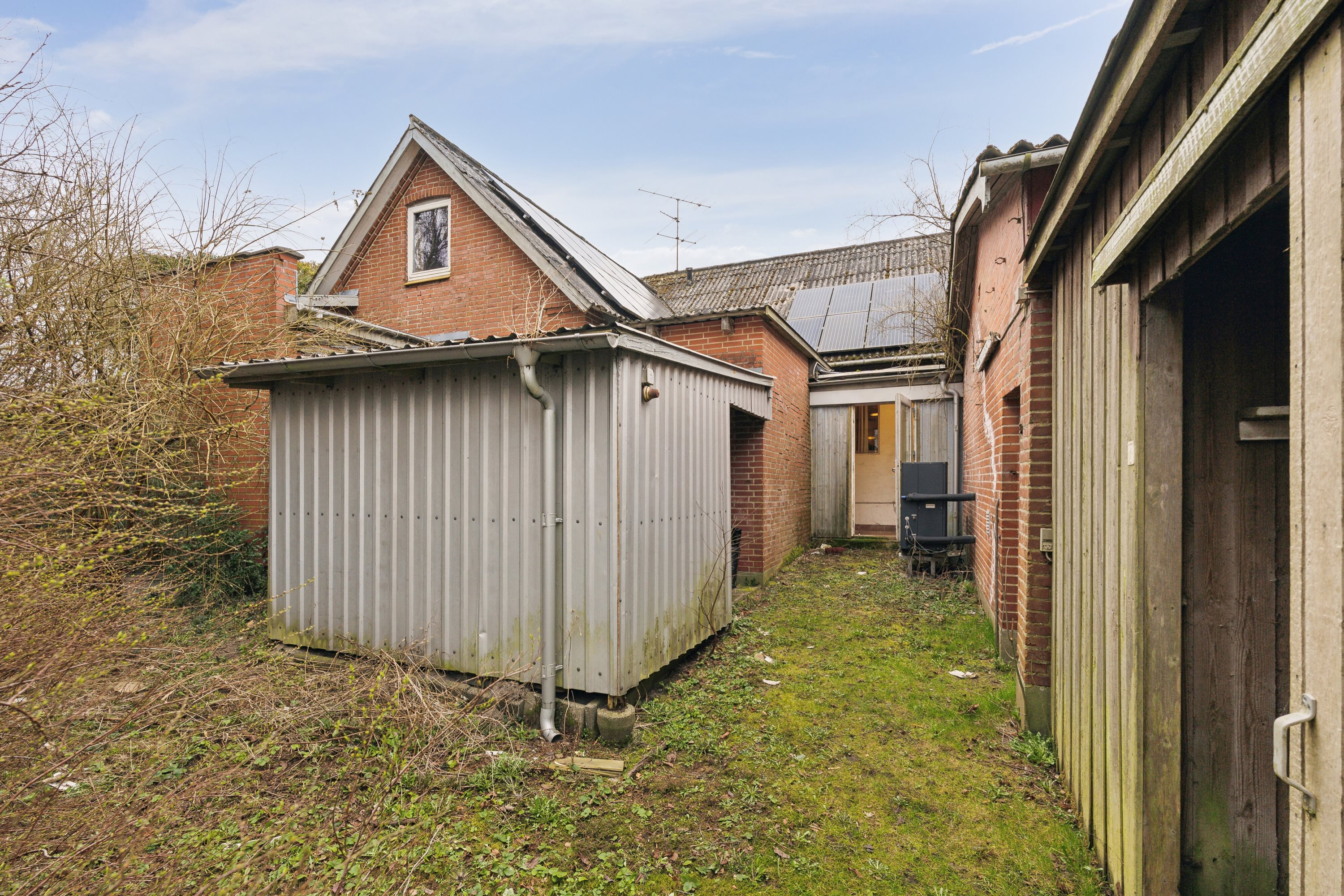 Fremhævet set fra haven billede i fuldskærmstilstand. Billede af Ørevadbrovej 65, 8632 Lemming