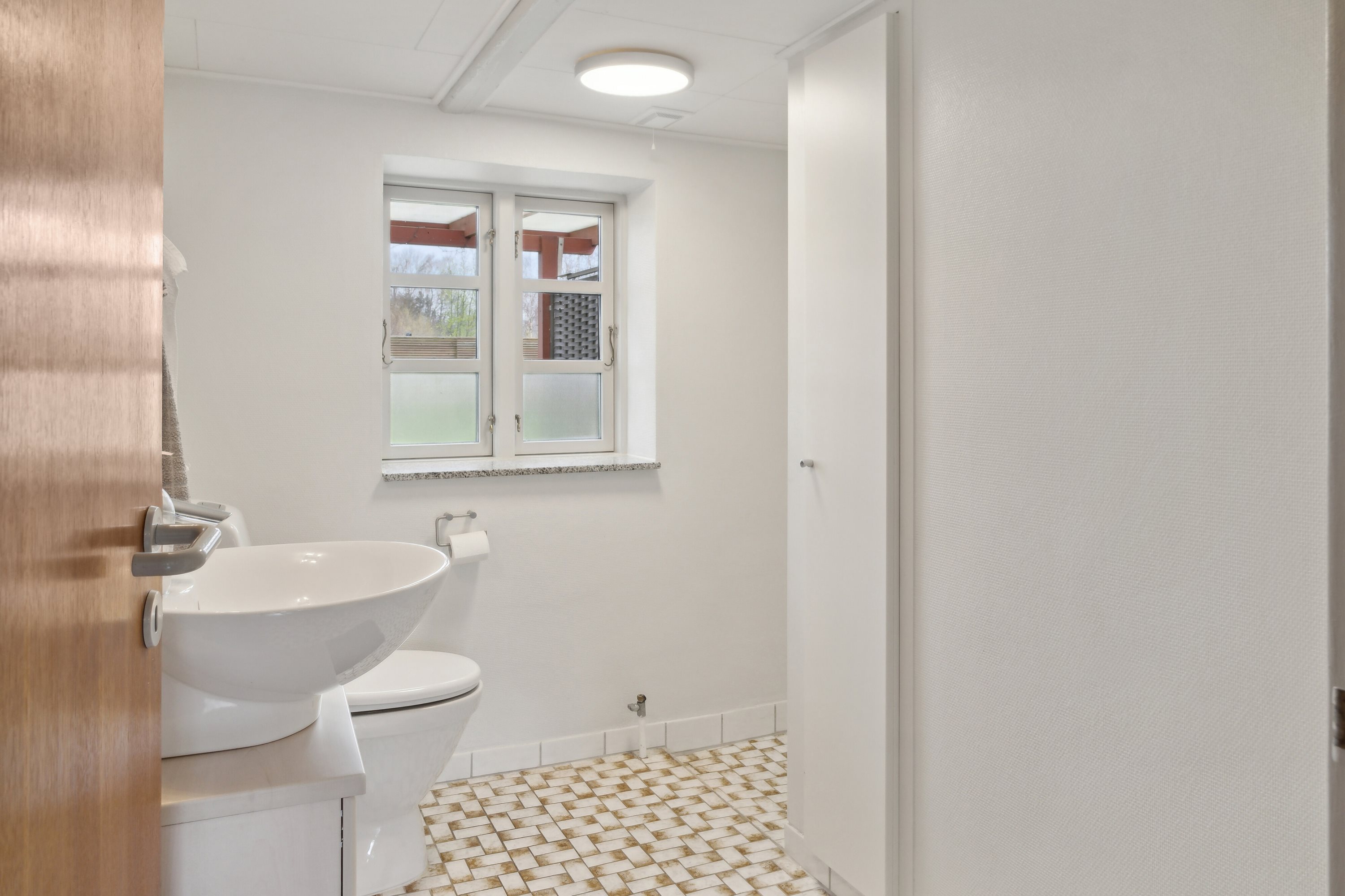 Fremhævet badeværelse billede i fuldskærmstilstand. Billede af Lundevej 1, Lunde, 5771 Stenstrup