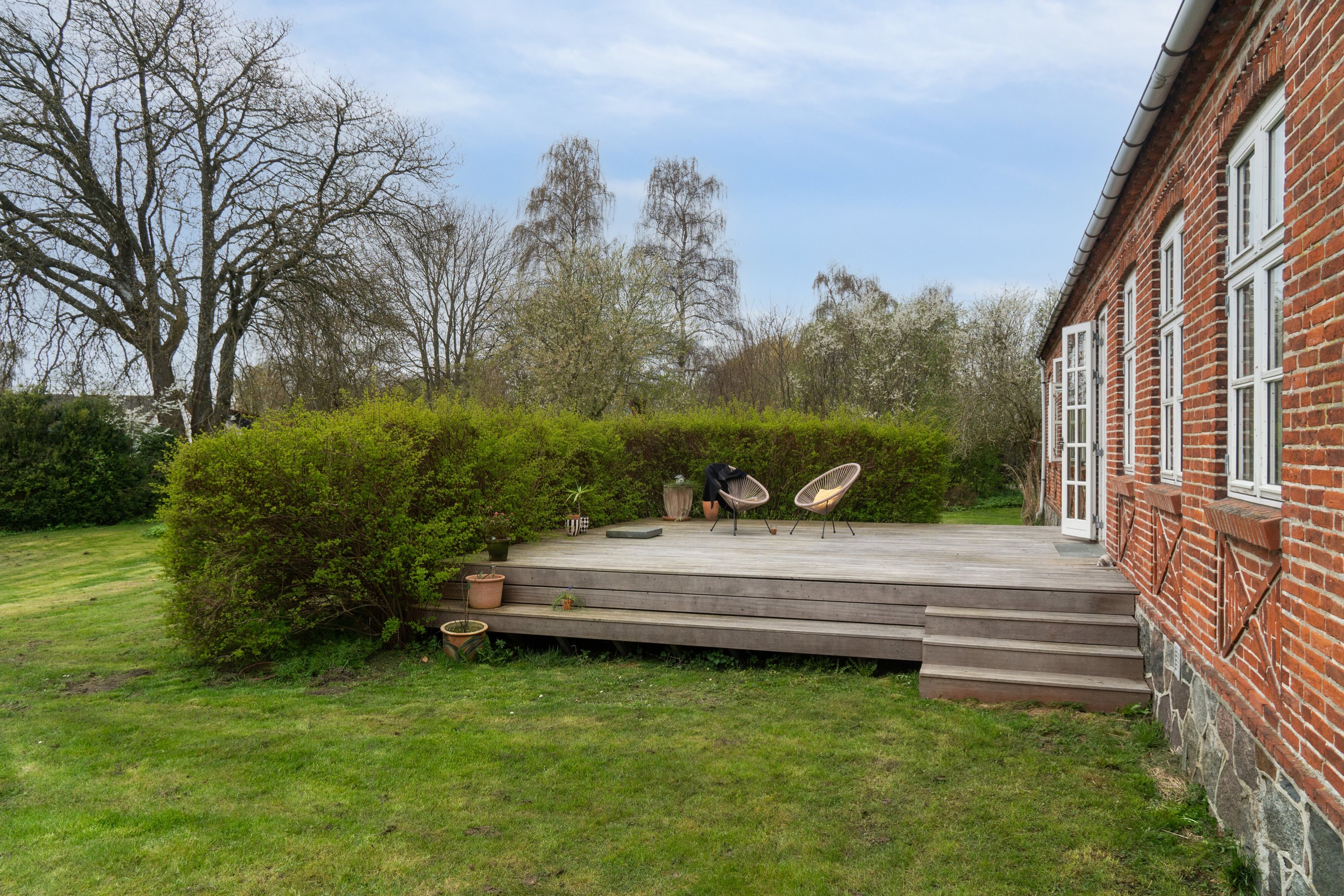 Fremhævet set fra haven billede i fuldskærmstilstand. Billede af Køng Kirkevej 7a og 7b, 4750 Lundby