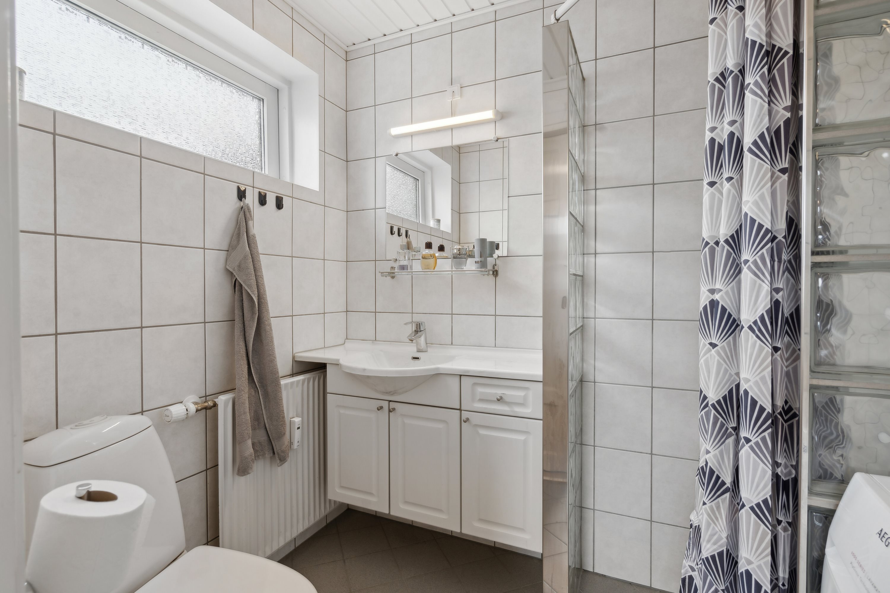 Fremhævet badeværelse billede i fuldskærmstilstand. Billede af Kobberbæksvej 75A, 5700 Svendborg