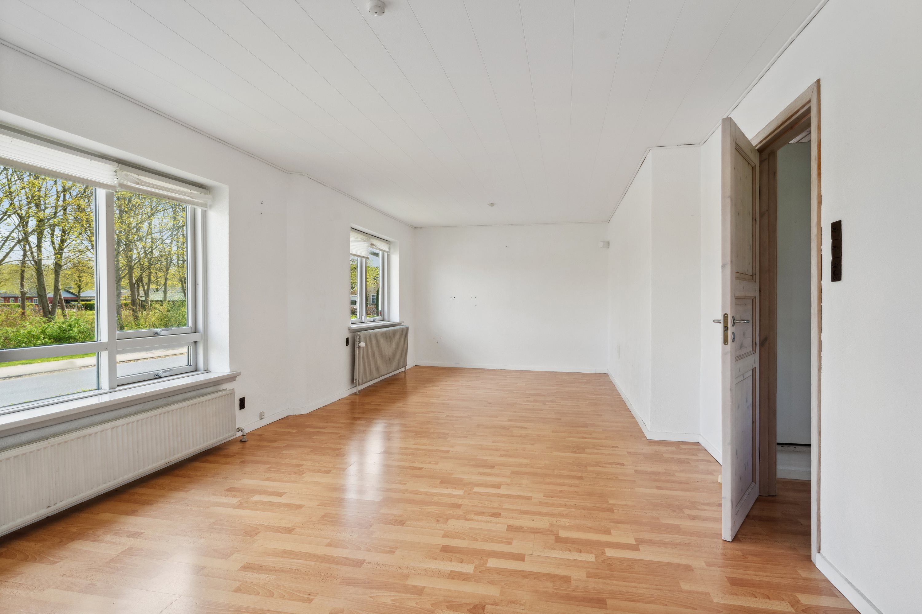 Fremhævet stue billede i fuldskærmstilstand. Billede af Skibelundvej 32, 8850 Bjerringbro