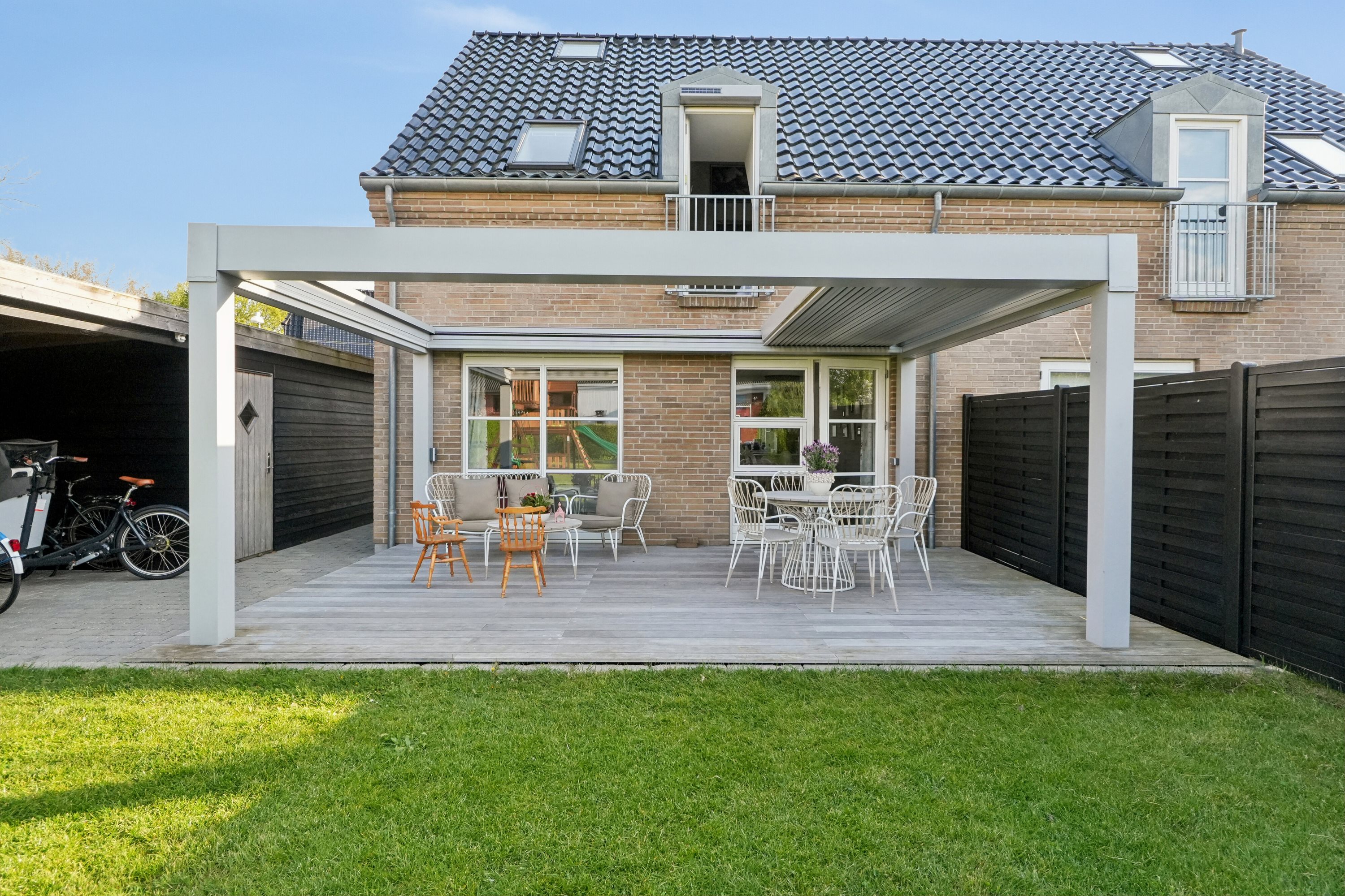 Fremhævet set fra haven billede i fuldskærmstilstand. Billede af Vibevej 1C, 5000 Odense C