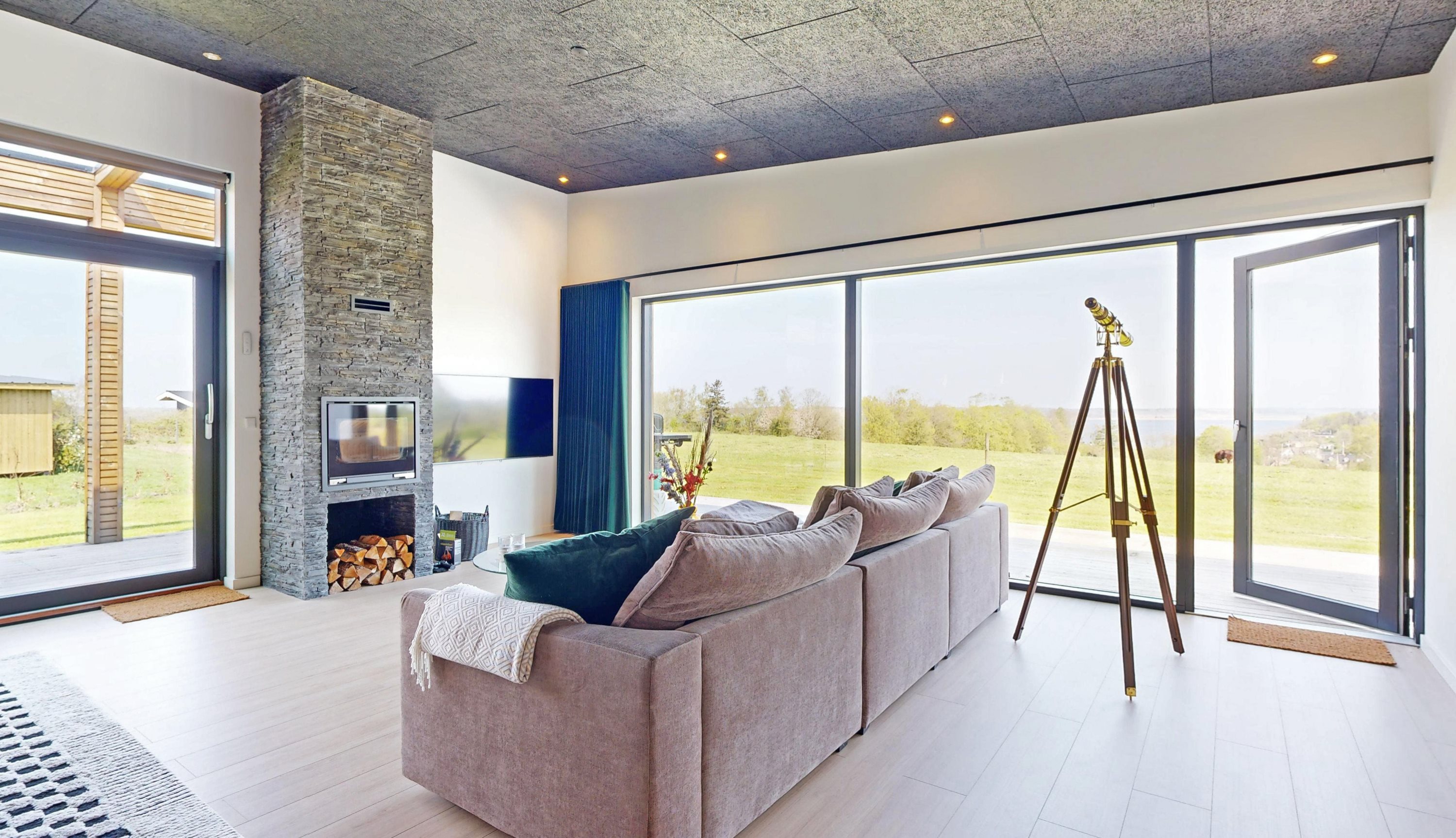 Fremhævet stue billede i fuldskærmstilstand. Billede af Isfuglebakken 3, Hjarbæk, 8831 Løgstrup