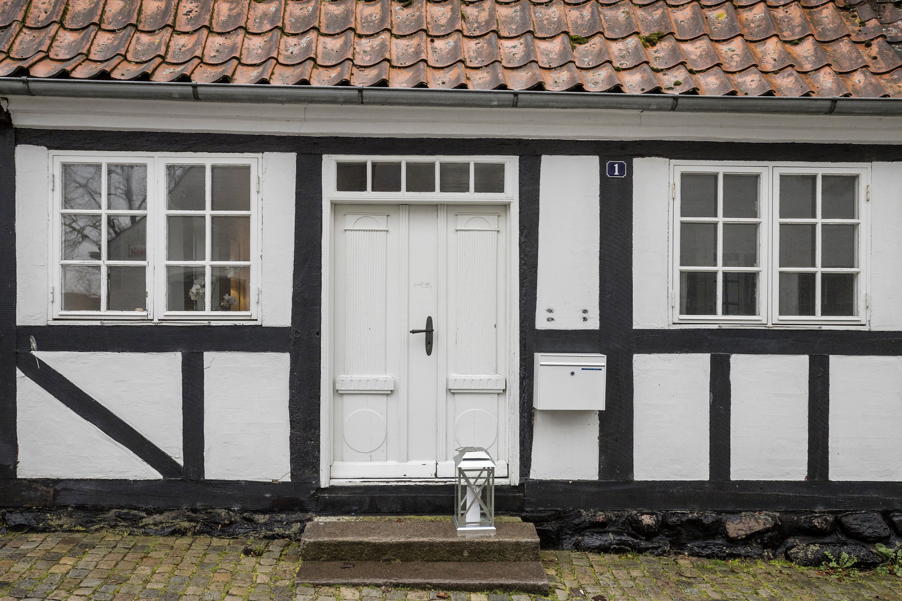 Fremhævet entré billede i fuldskærmstilstand. Billede af Hægersgade 1, 6100 Haderslev