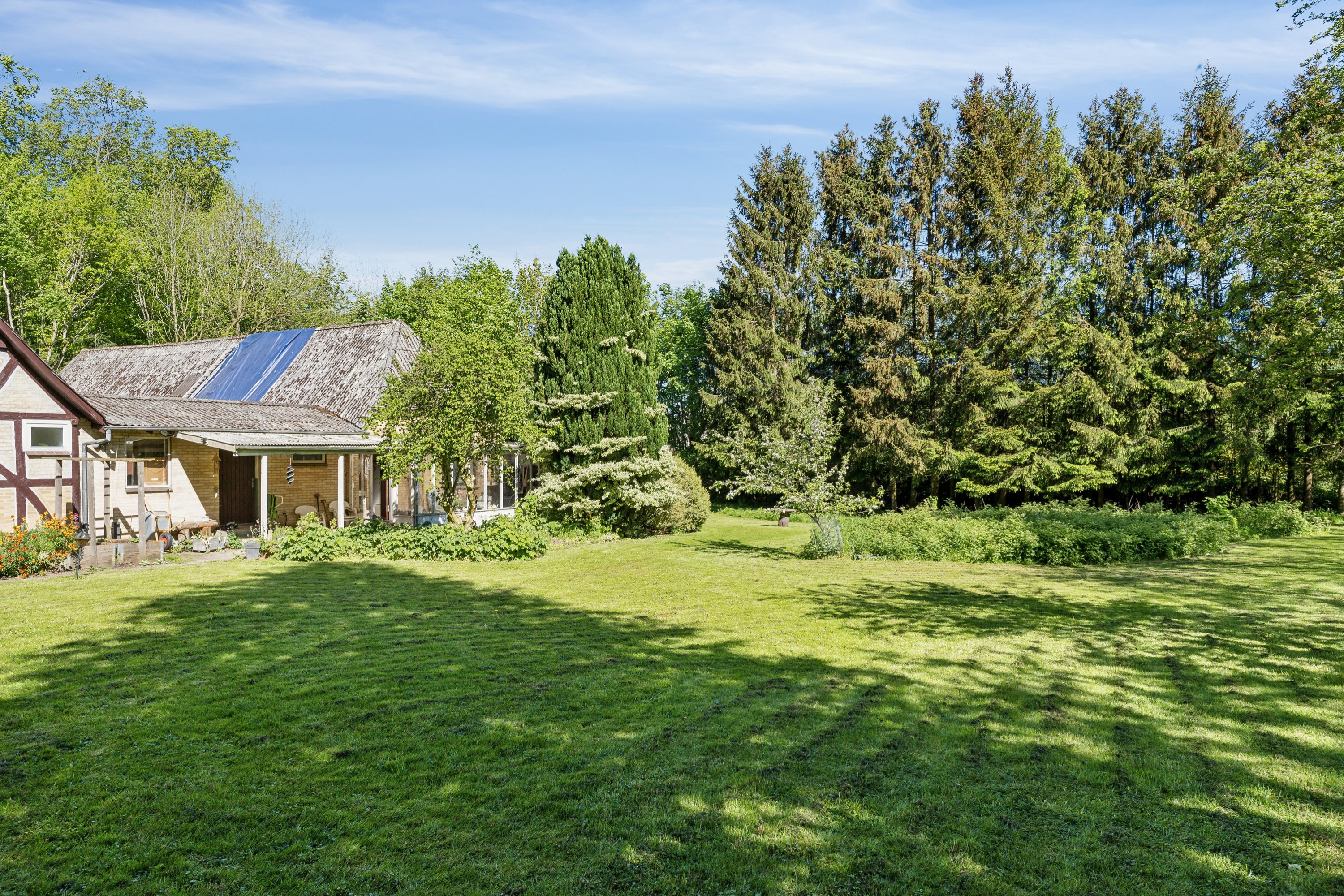 Fremhævet set fra haven billede i fuldskærmstilstand. Billede af Lillemarksvej 33, Bolt Gd Skov, 5750 Ringe