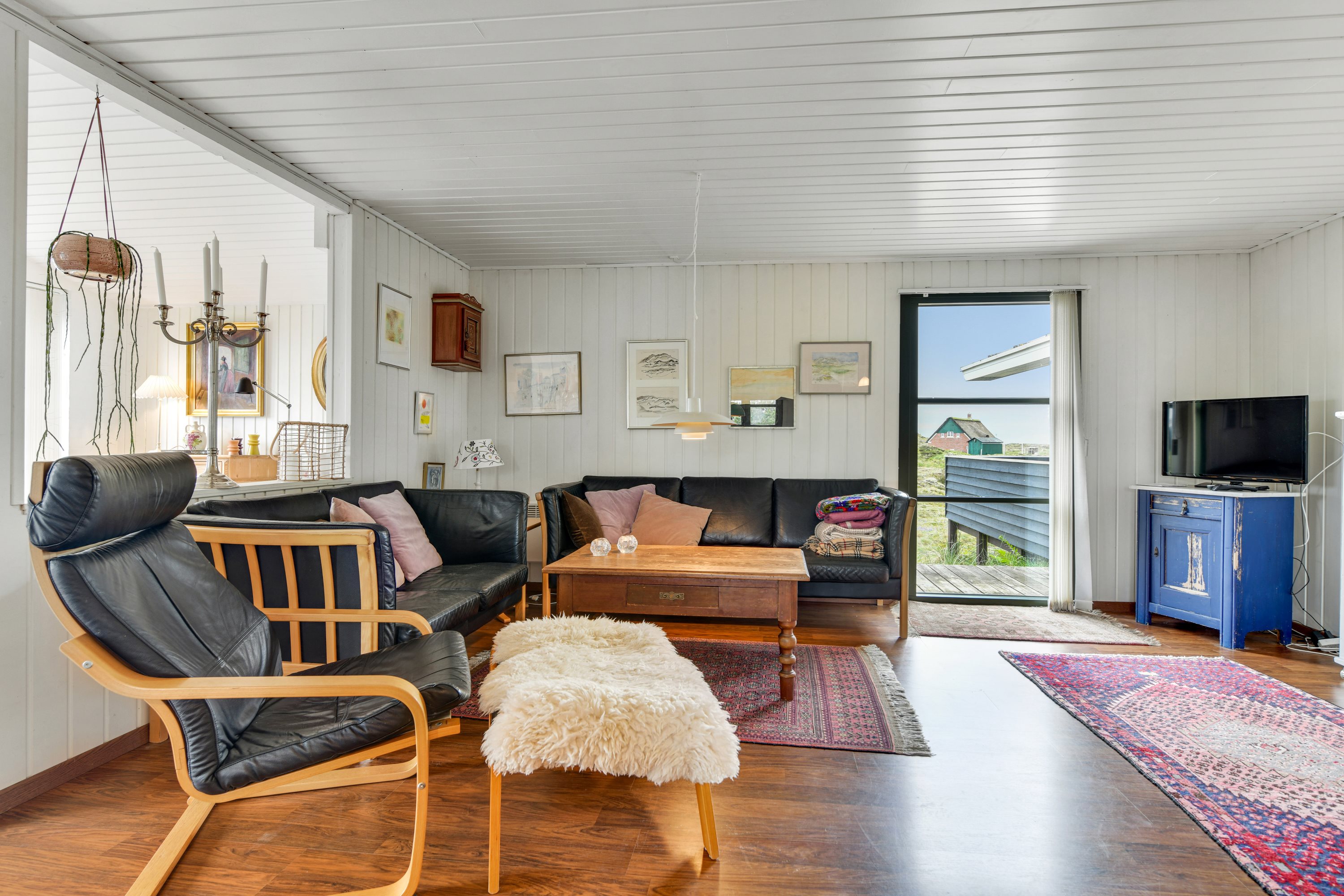 Fremhævet stue billede i fuldskærmstilstand. Billede af Skræddermarken 3, Sønderho, 6720 Fanø