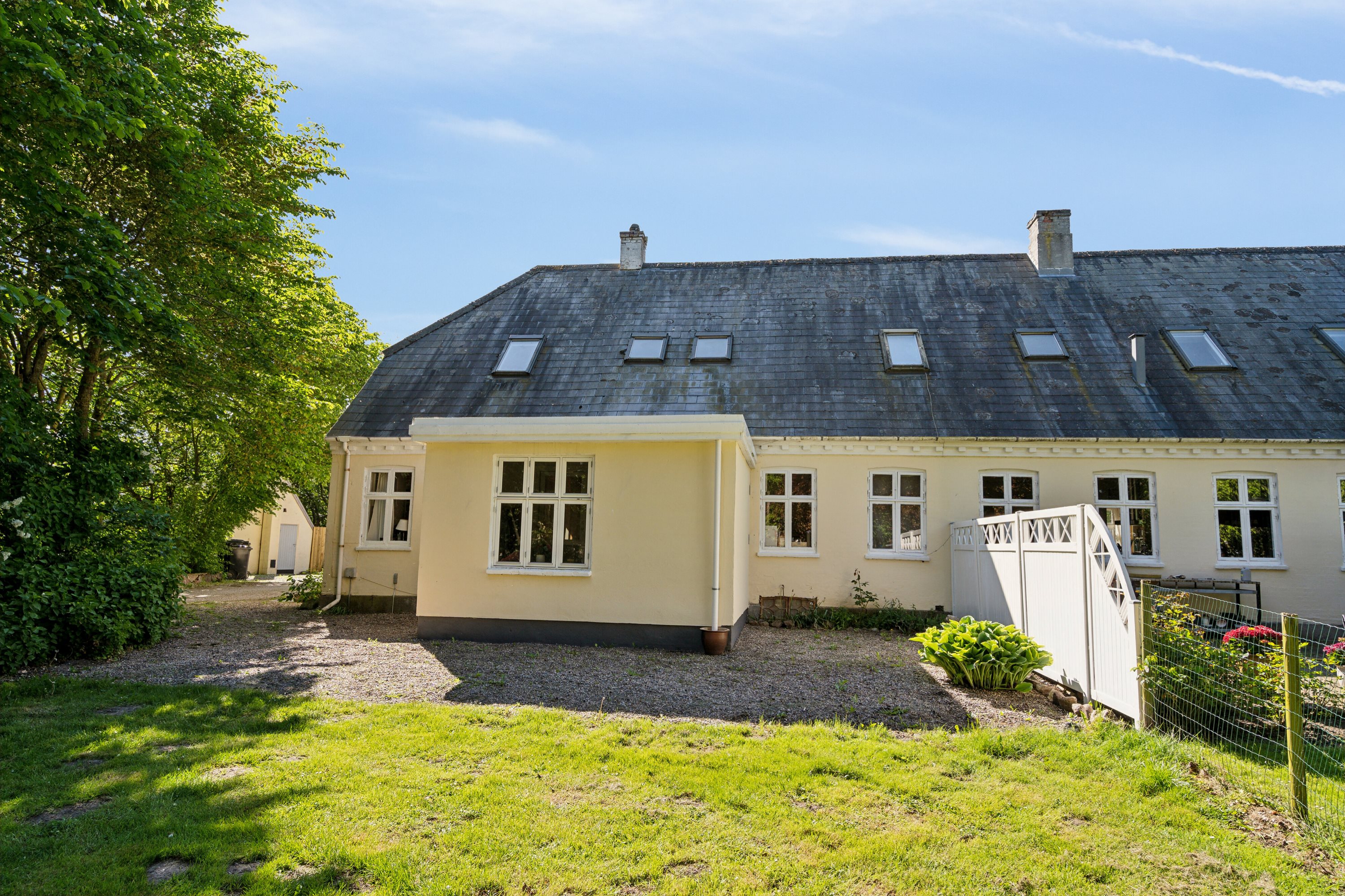 Fremhævet set fra haven billede i fuldskærmstilstand. Billede af Volderslev Bygade 7B, Volderslev, 5260 Odense S