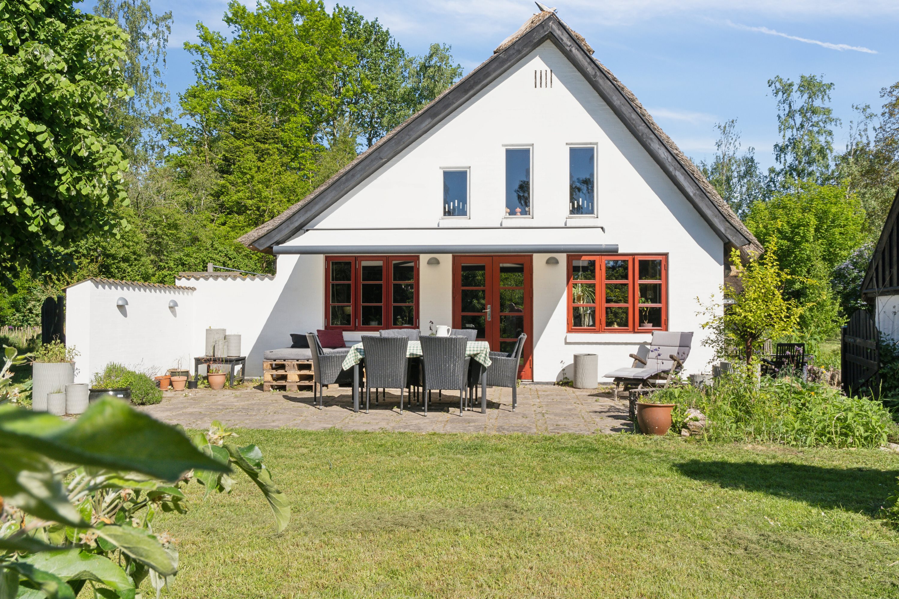 Fremhævet set fra haven billede i fuldskærmstilstand. Billede af Stormgårdsvej 13, Skuldelev, 4050 Skibby