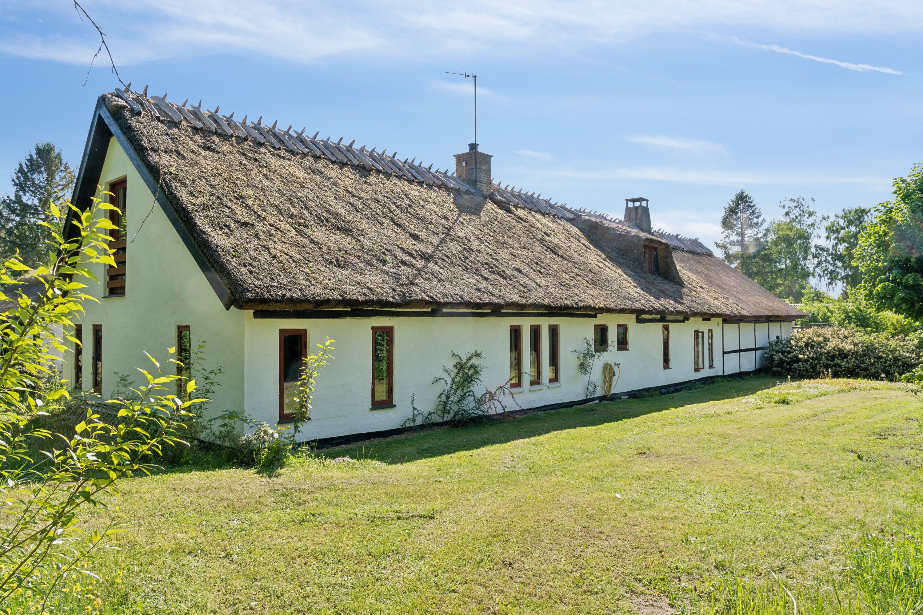 Fremhævet set fra haven billede i fuldskærmstilstand. Billede af Stormgårdsvej 13, Skuldelev, 4050 Skibby