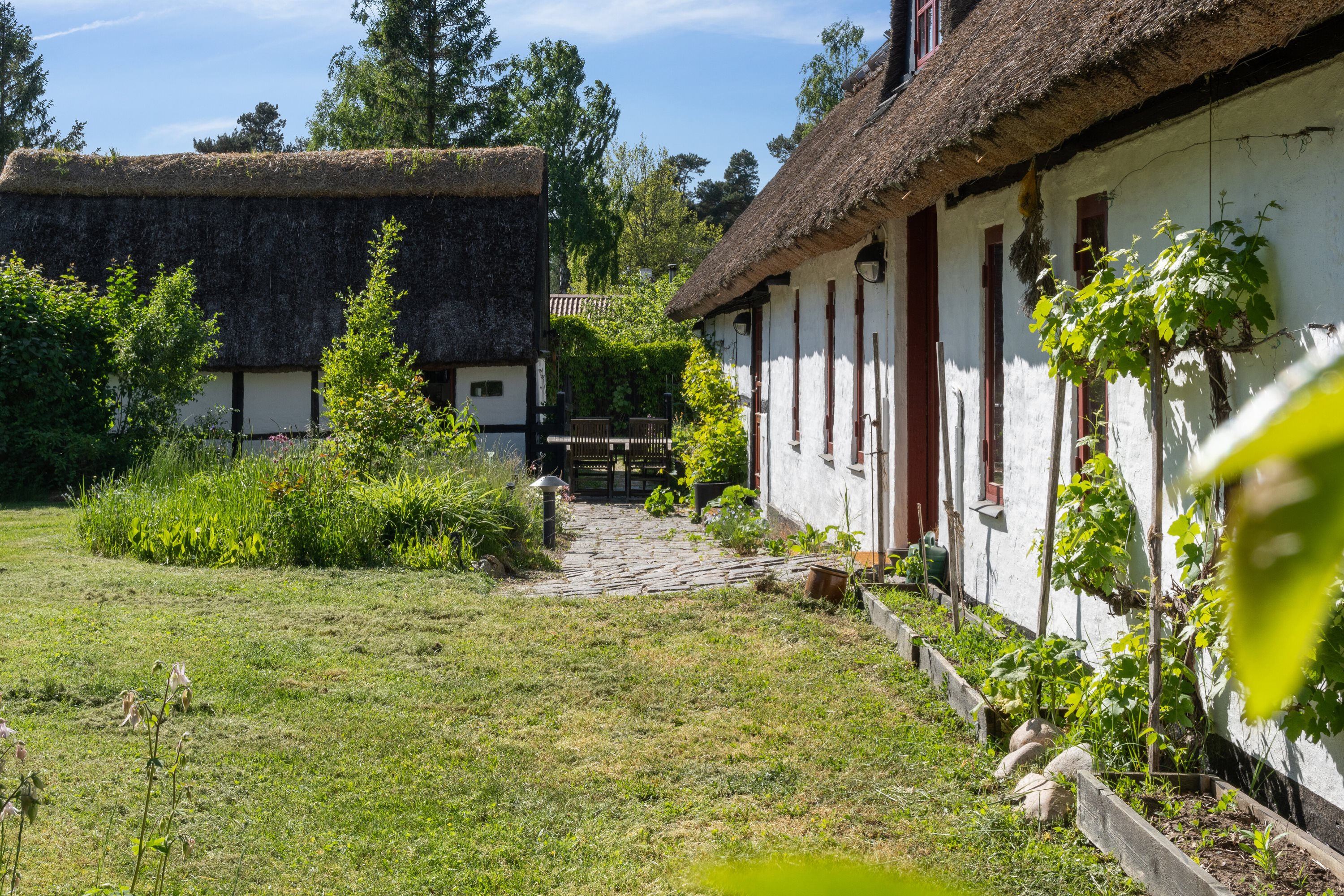 Fremhævet set fra haven billede i fuldskærmstilstand. Billede af Stormgårdsvej 13, Skuldelev, 4050 Skibby