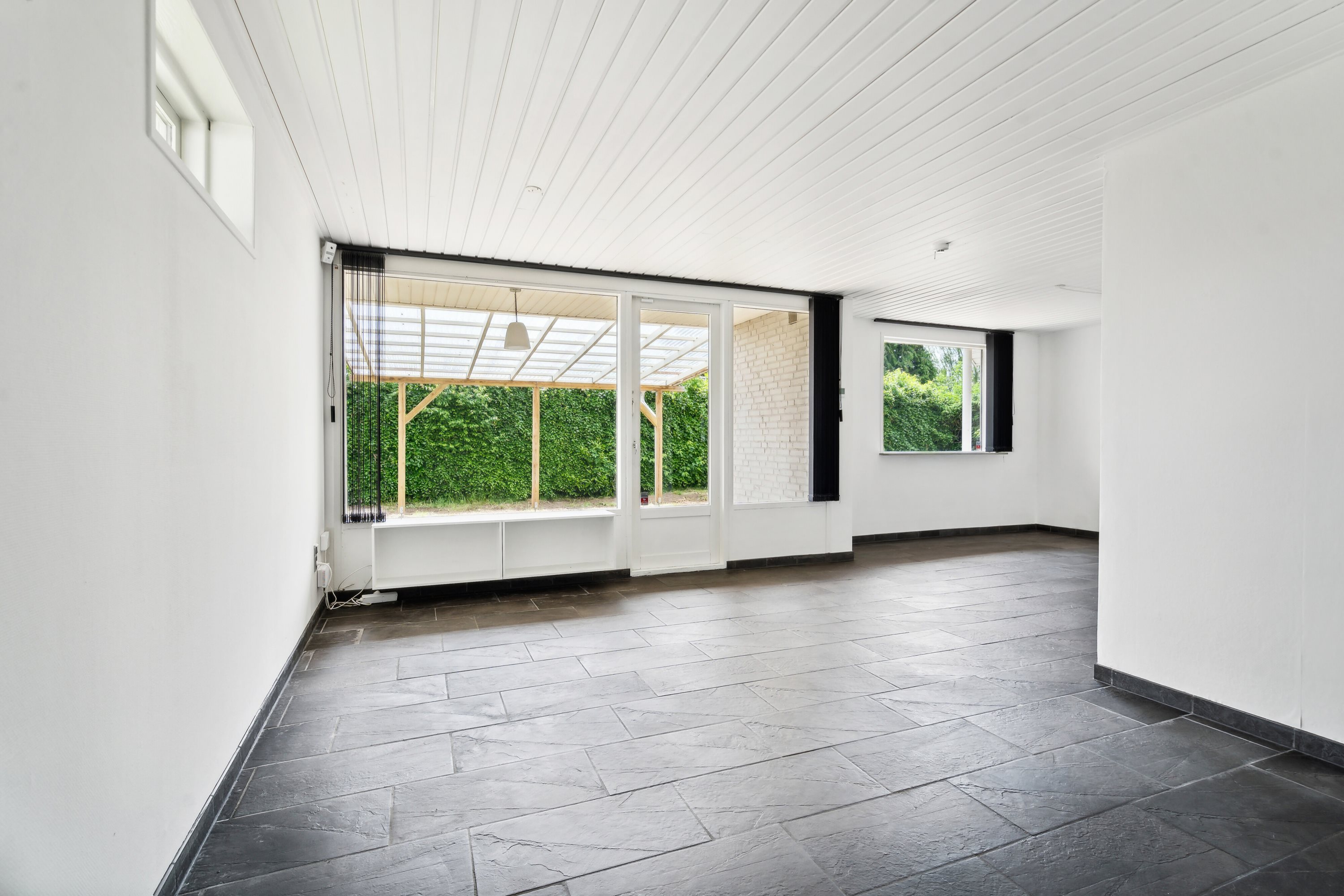 Fremhævet stue billede i fuldskærmstilstand. Billede af Kirkegade 77, Hjordkær, 6230 Rødekro