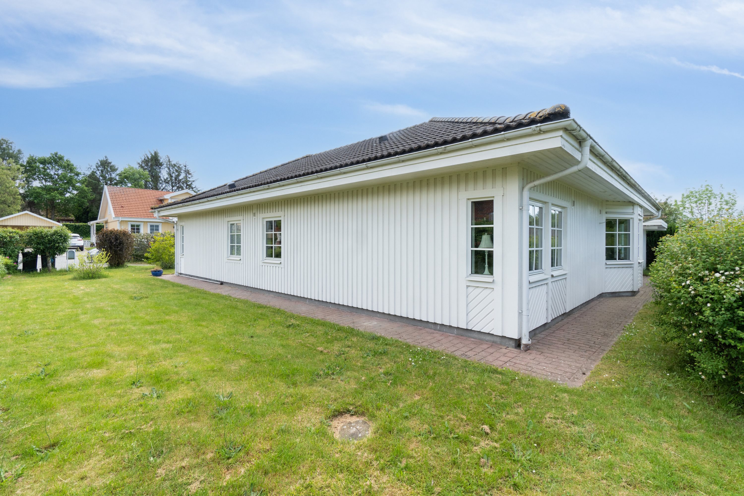 Fremhævet set fra haven billede i fuldskærmstilstand. Billede af Hanevænget 9, Hanehoved, 3300 Frederiksværk