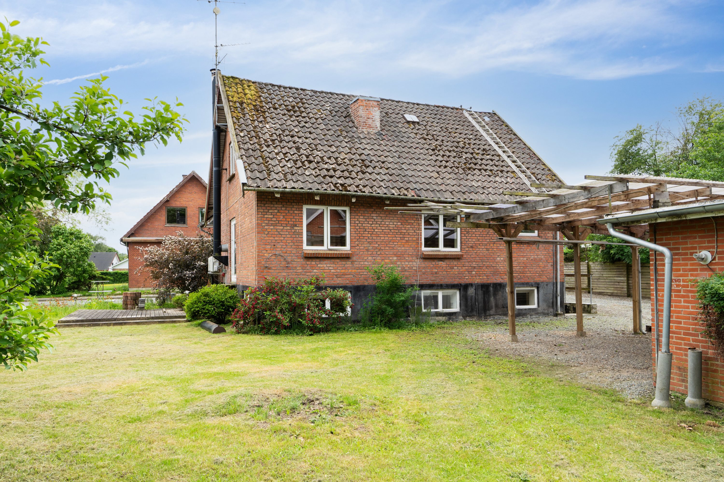 Fremhævet set fra haven billede i fuldskærmstilstand. Billede af Nørrevangsvej 12, Demstrup, 8620 Kjellerup