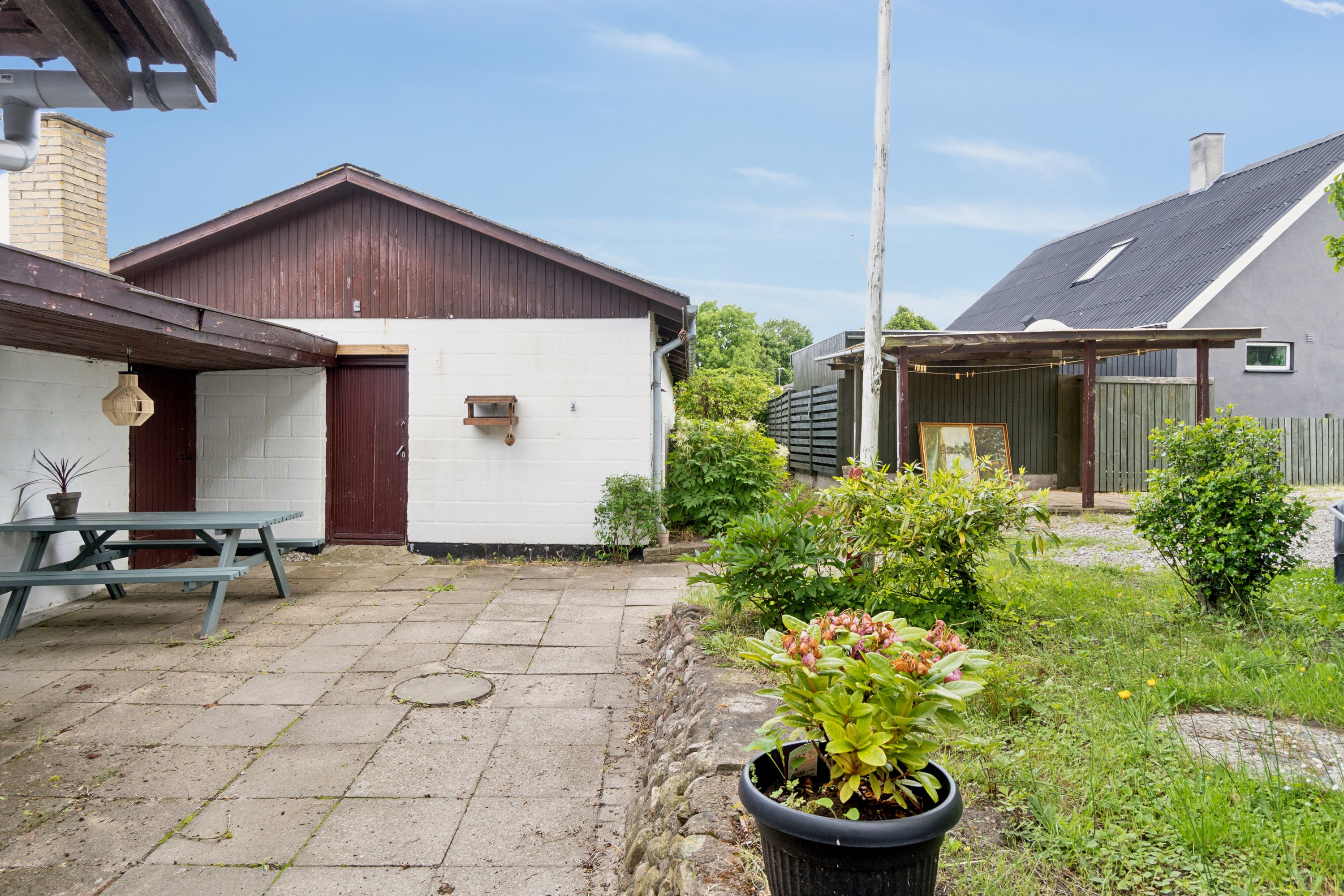 Fremhævet set fra haven billede i fuldskærmstilstand. Billede af Højby Hovedgade 76, 4573 Højby