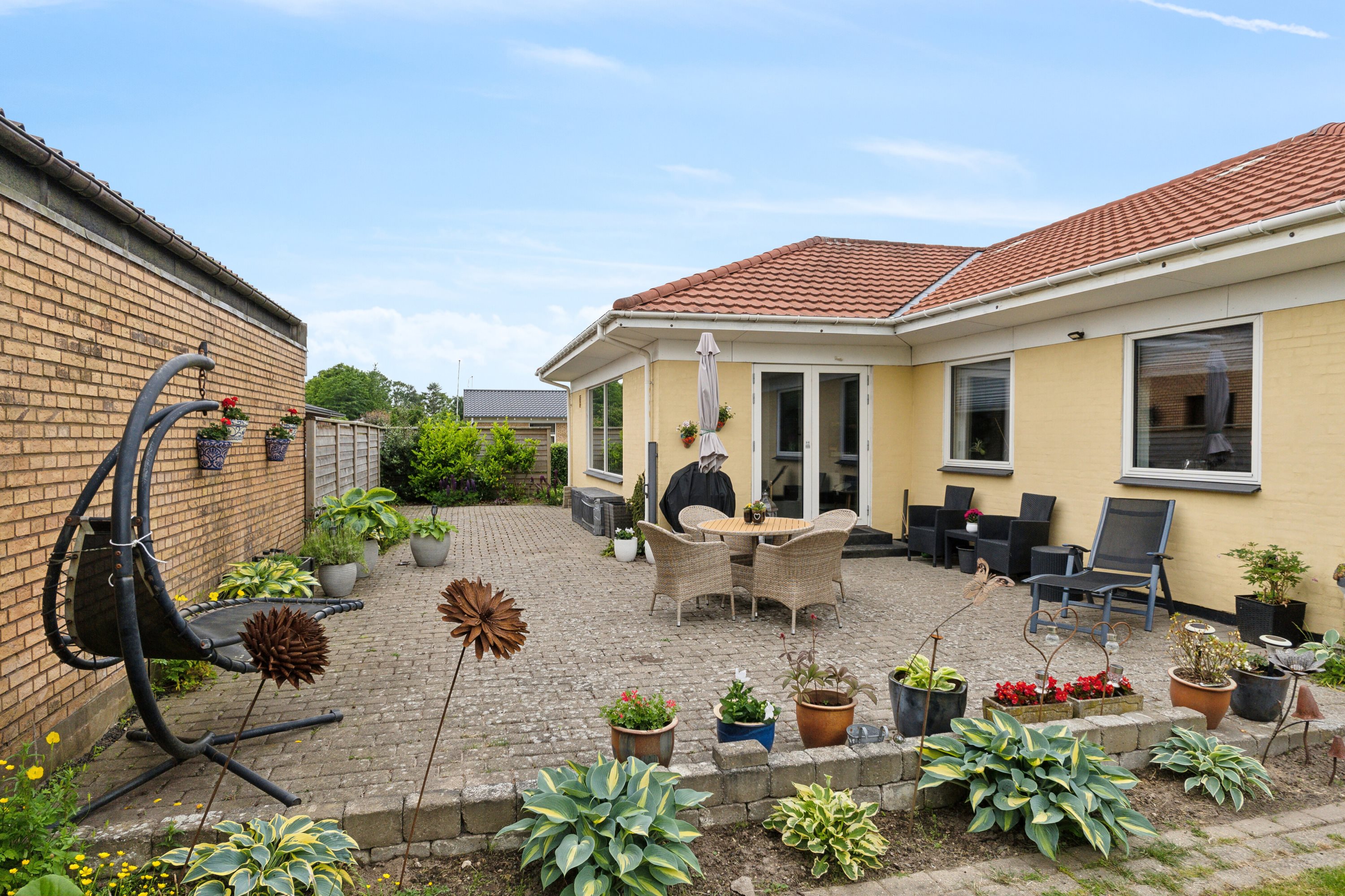 Fremhævet terrasse billede i fuldskærmstilstand. Billede af Irisvej 22, 9800 Hjørring