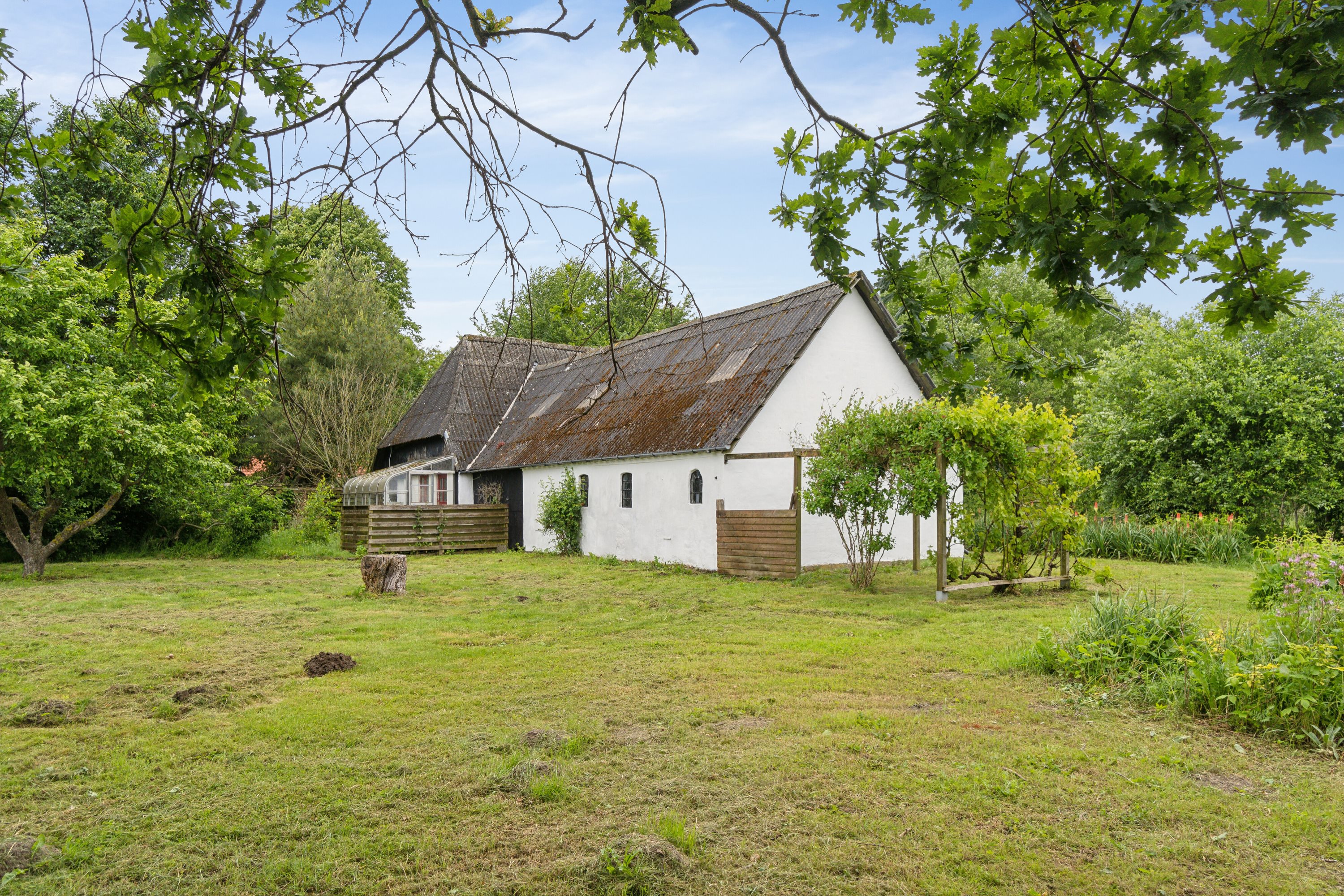 Fremhævet set fra haven billede i fuldskærmstilstand. Billede af Husmandsalleen 14, 5884 Gudme