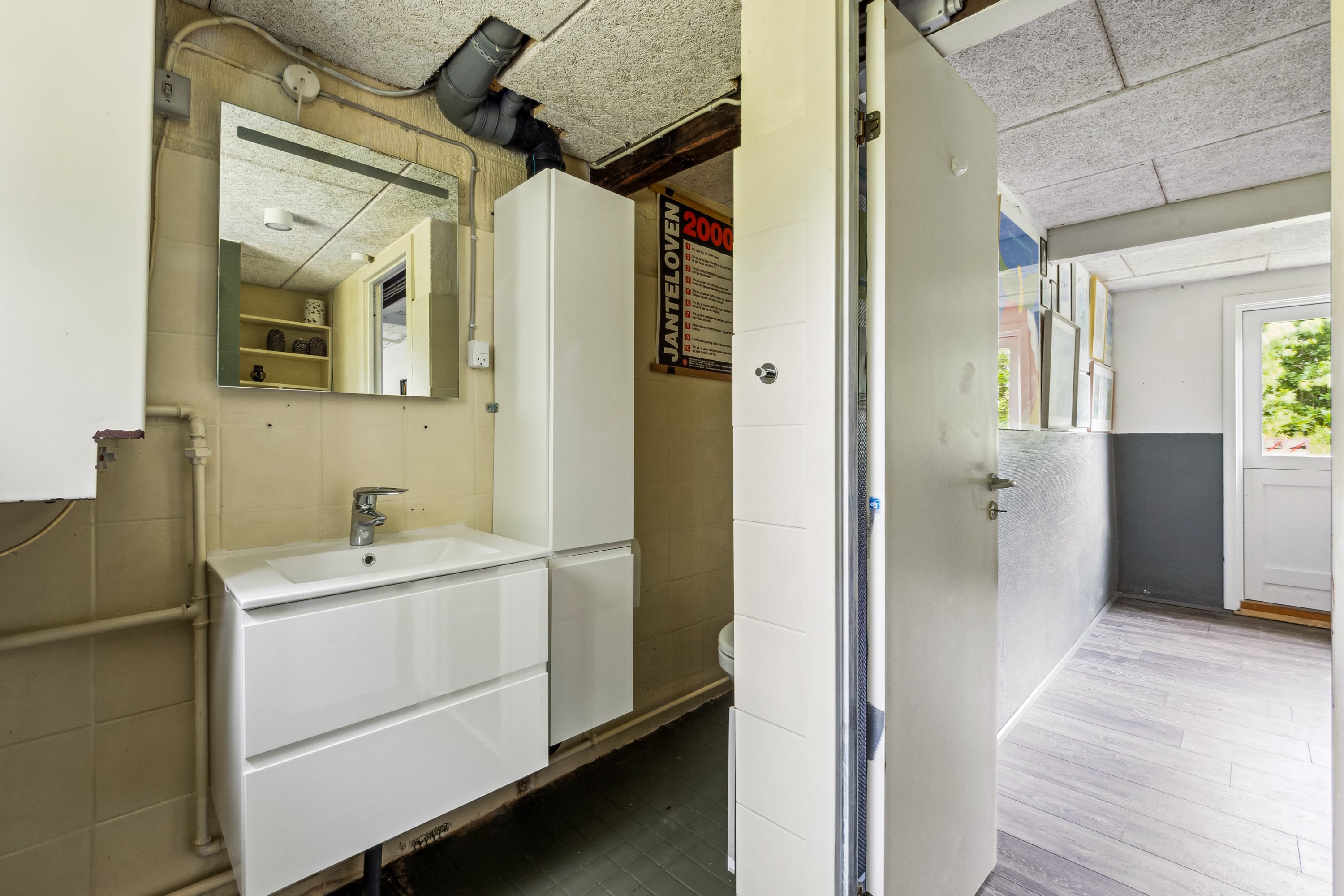 Fremhævet badeværelse billede i fuldskærmstilstand. Billede af Tyttebærvej 14, Vile, 7870 Roslev