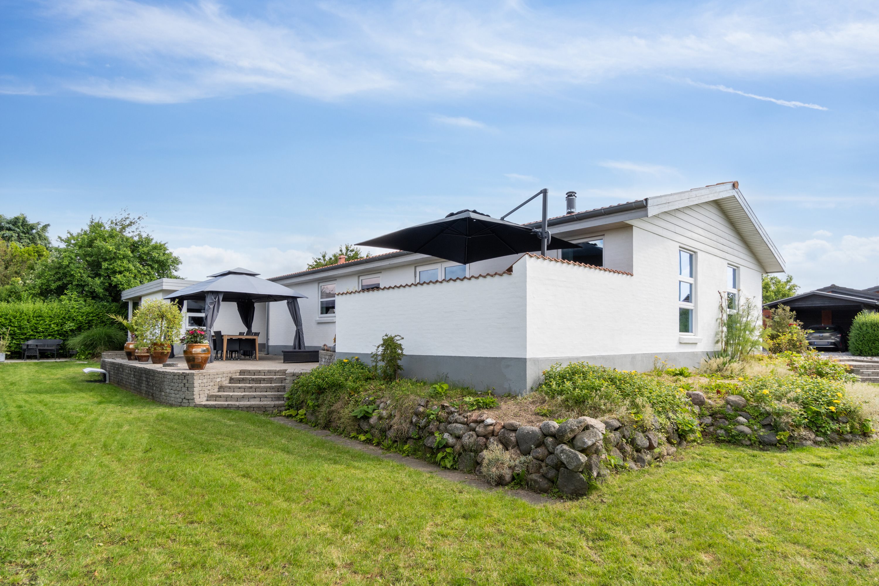 Fremhævet set fra haven billede i fuldskærmstilstand. Billede af Bøgeløkken 5, Thurø, 5700 Svendborg