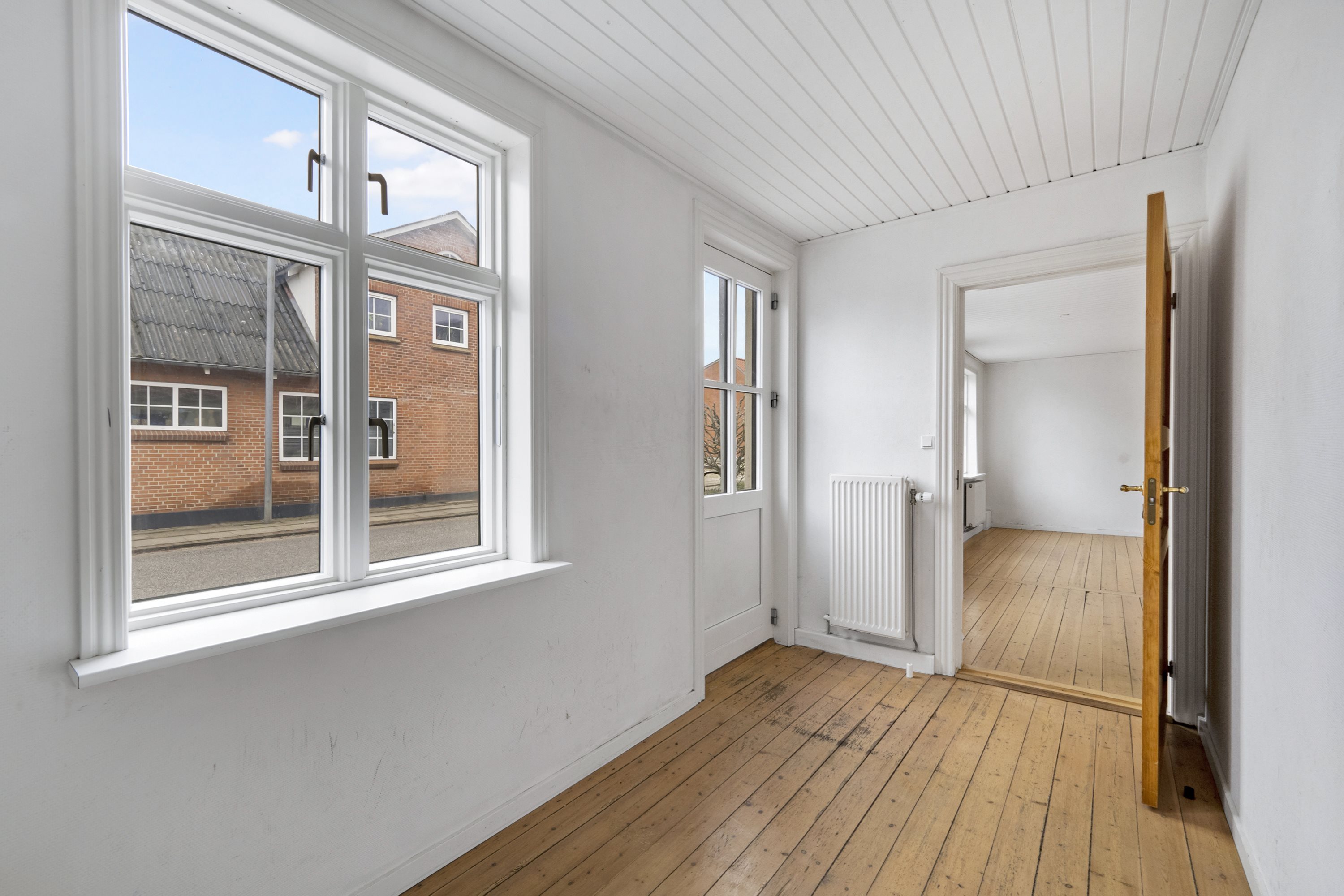 Fremhævet indgang billede i fuldskærmstilstand. Billede af Hovedgaden 78, 7752 Snedsted