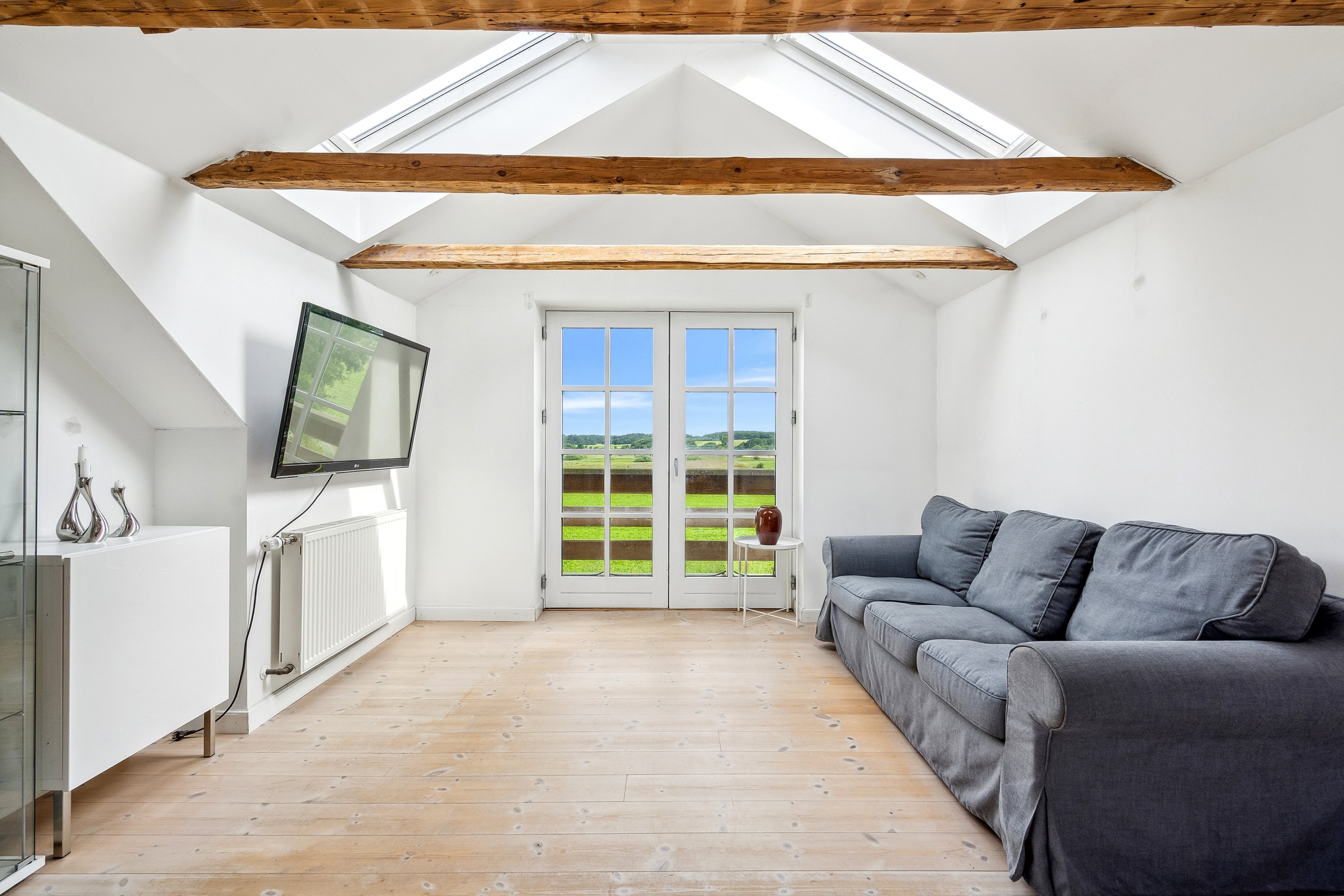 Fremhævet stue billede i fuldskærmstilstand. Billede af Bygaden 5, Kastbjerg, 8970 Havndal