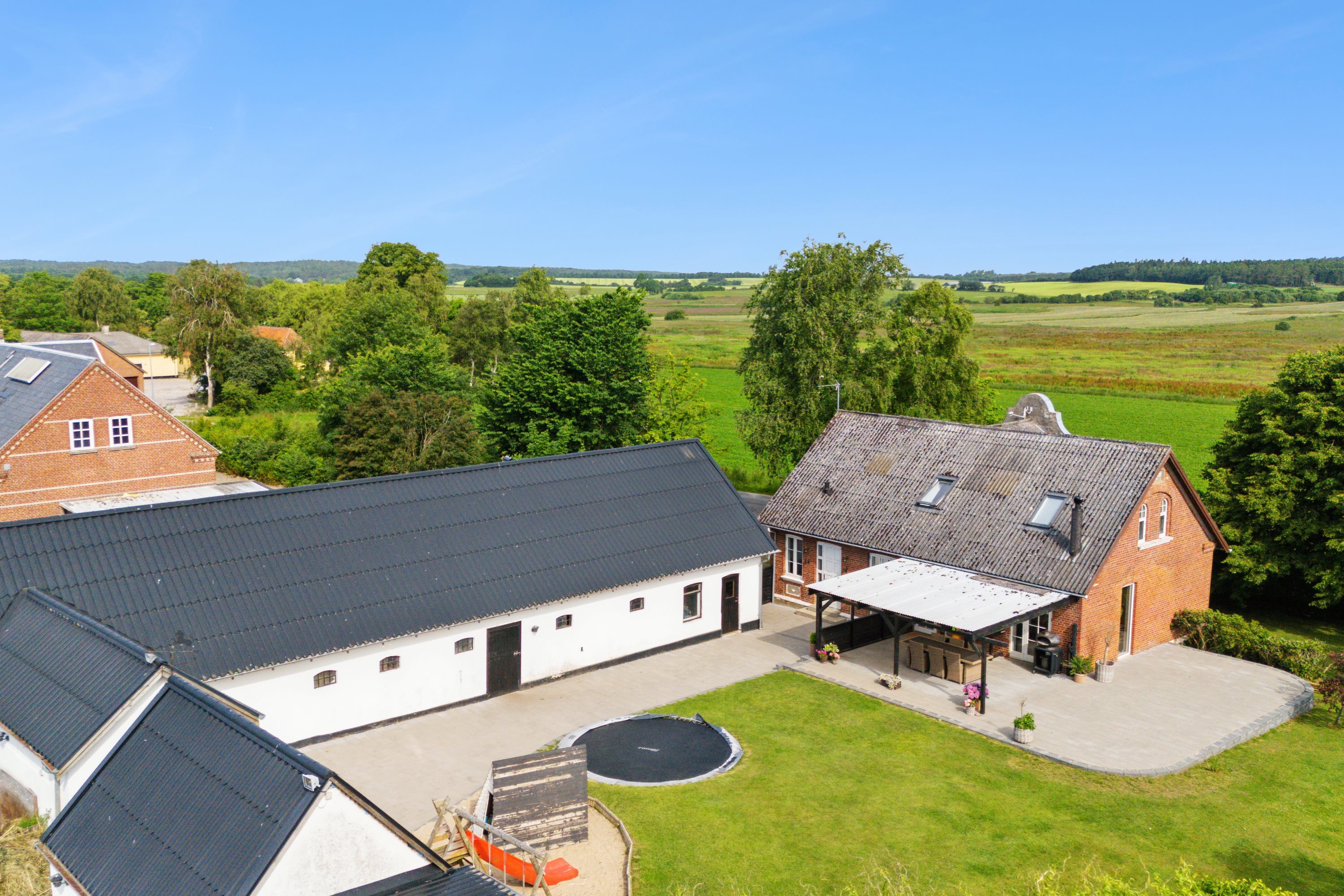 Fremhævet ejendom 1 billede i fuldskærmstilstand. Billede af Bygaden 5, Kastbjerg, 8970 Havndal