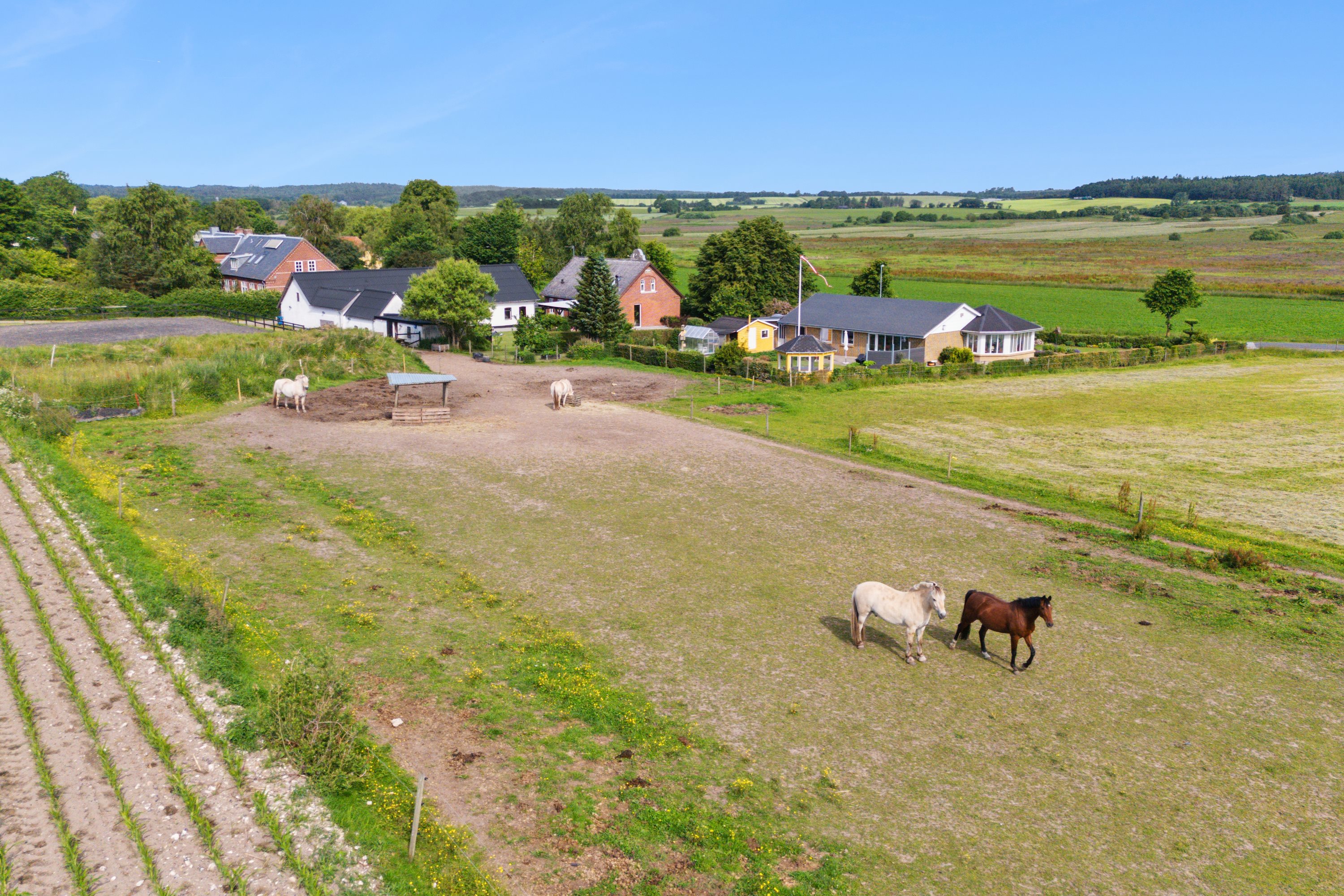 Fremhævet luftfoto billede i fuldskærmstilstand. Billede af Bygaden 5, Kastbjerg, 8970 Havndal