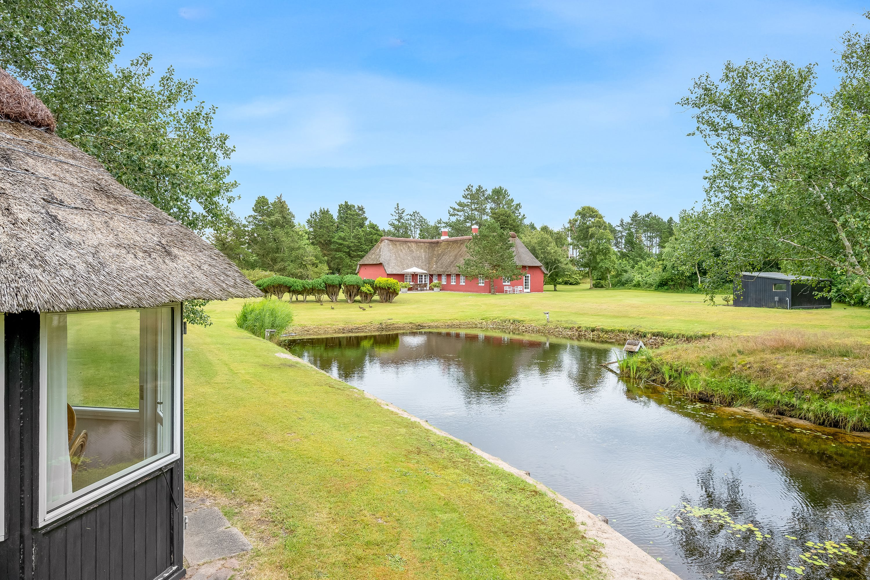 Fremhævet udendørs billede i fuldskærmstilstand. Billede af Gl Skolevej 18, Kongsmark, 6792 Rømø