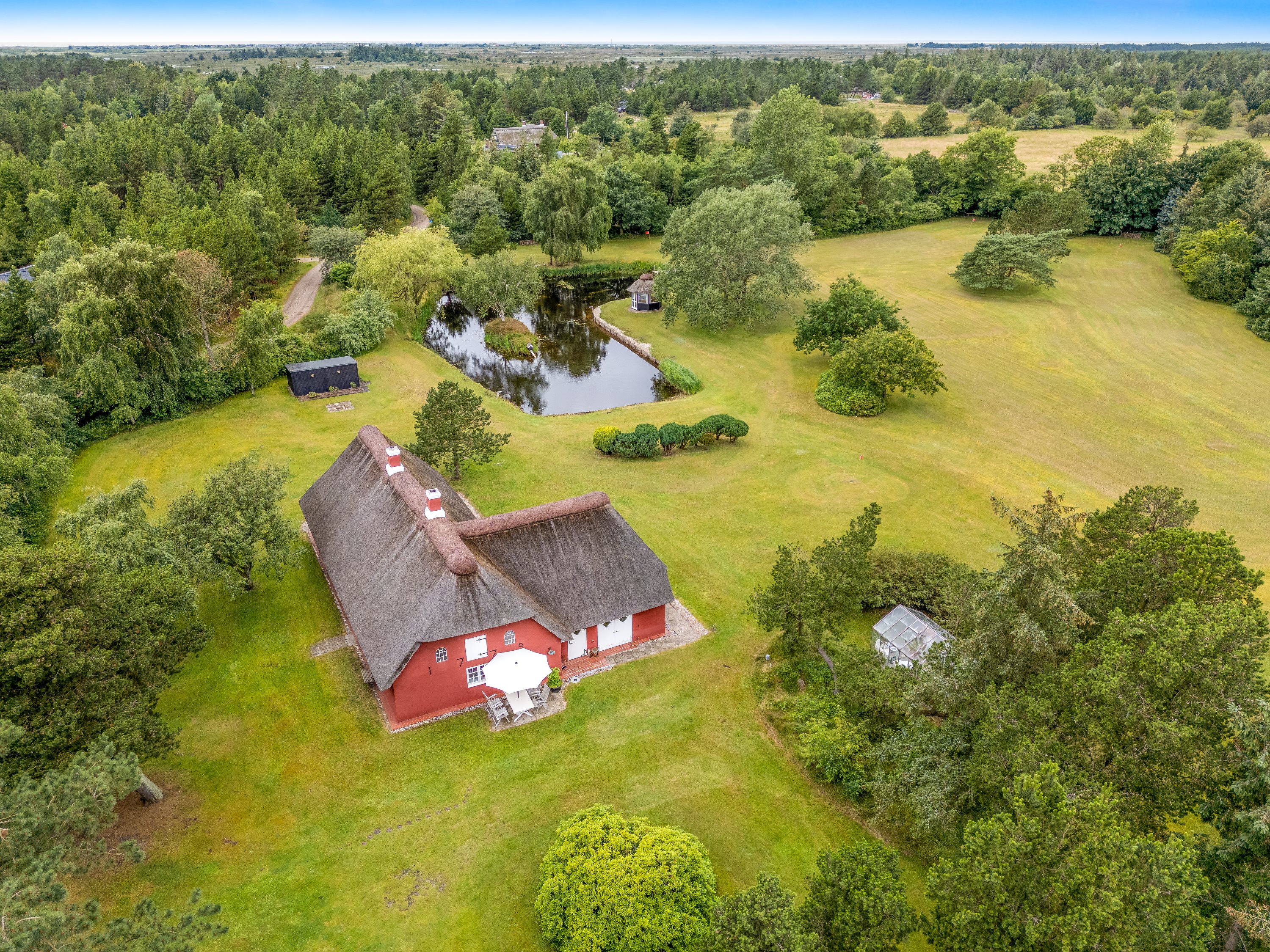 Fremhævet udendørs billede i fuldskærmstilstand. Billede af Gl Skolevej 18, Kongsmark, 6792 Rømø