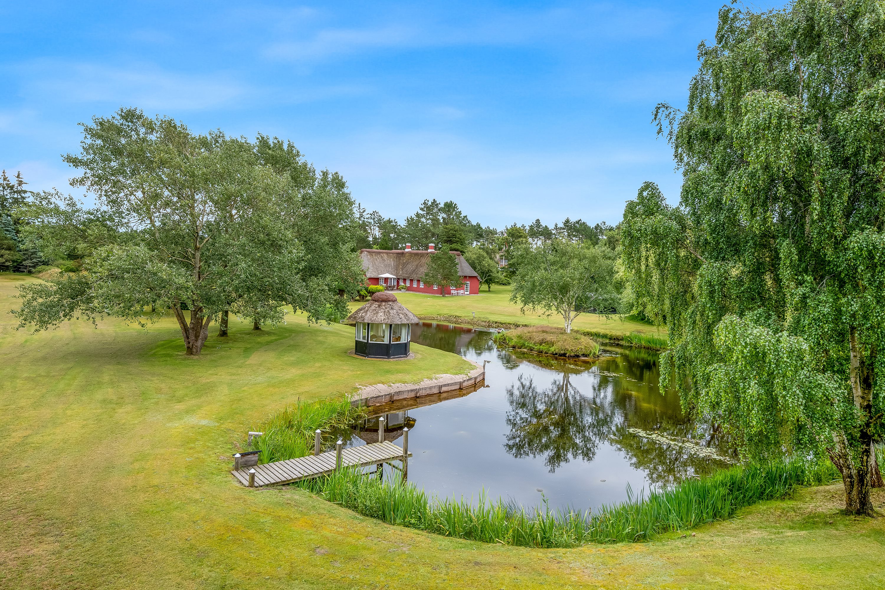 Fremhævet udendørs billede i fuldskærmstilstand. Billede af Gl Skolevej 18, Kongsmark, 6792 Rømø
