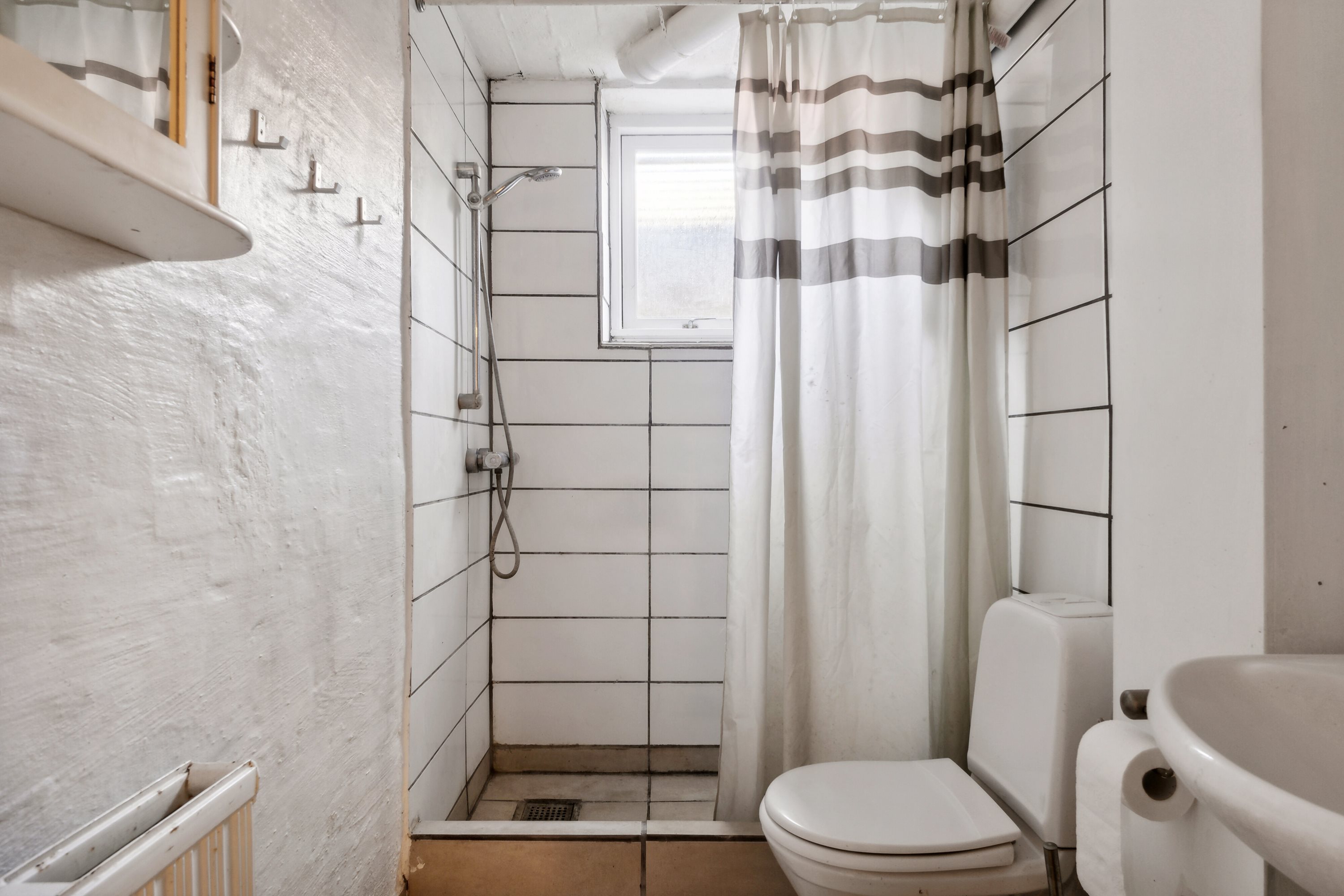 Fremhævet badeværelse billede i fuldskærmstilstand. Billede af Skovmærkevej 12, 5220 Odense SØ