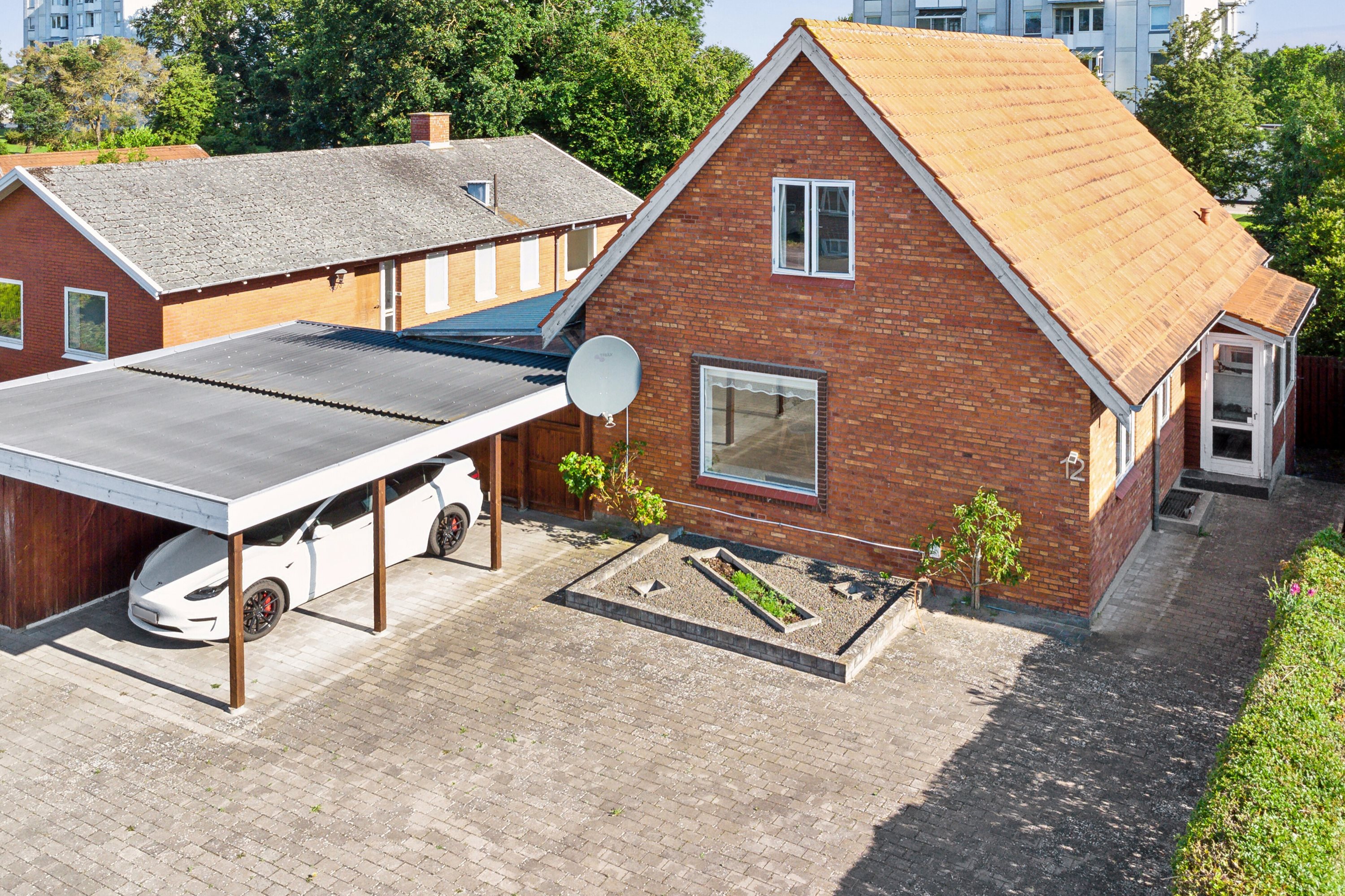 Fremhævet carport billede i fuldskærmstilstand. Billede af Skovmærkevej 12, 5220 Odense SØ