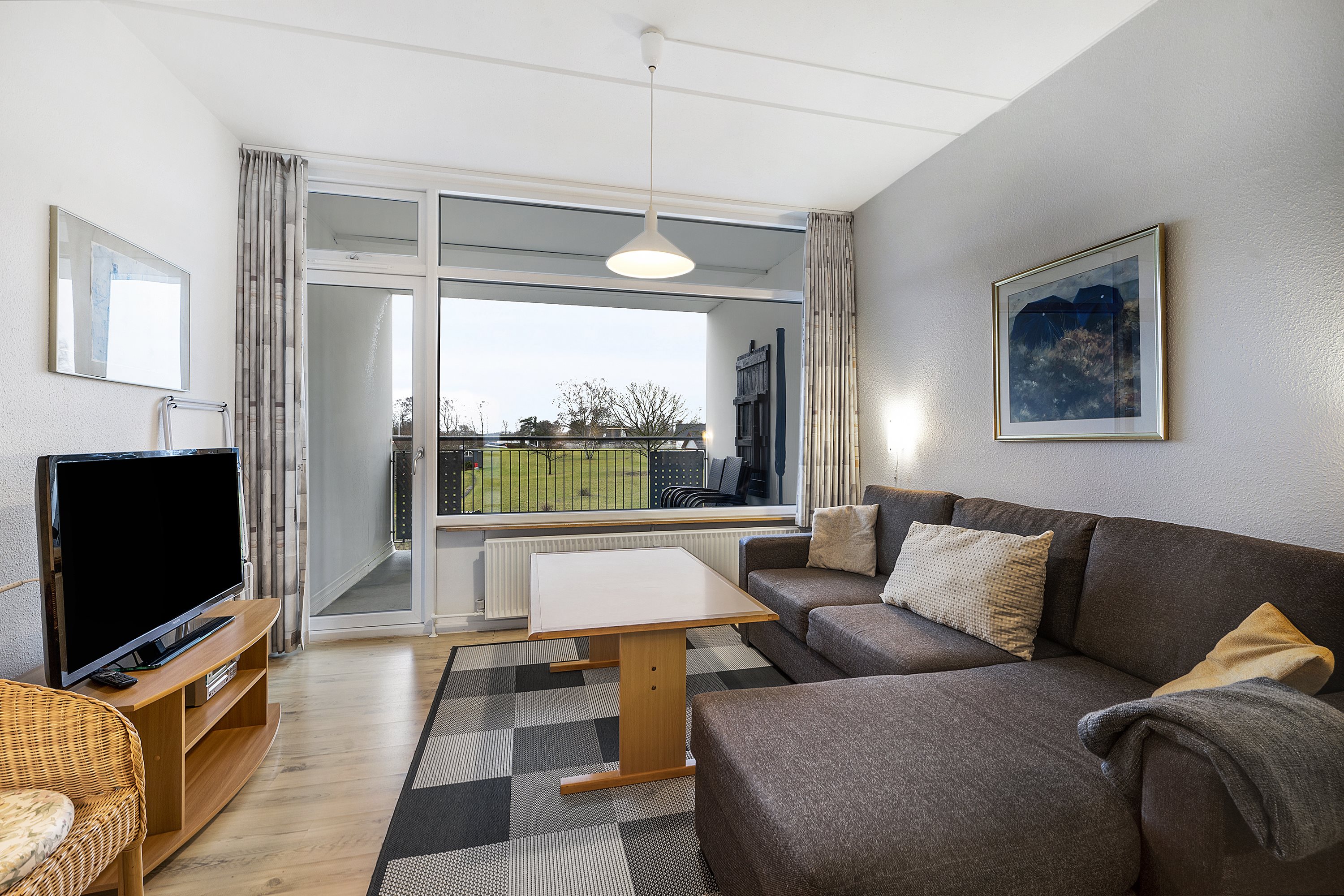 Fremhævet stue billede i fuldskærmstilstand. Billede af Fægangsvej 11A, 1. 212., Bønnerup Strand, 8585 Glesborg