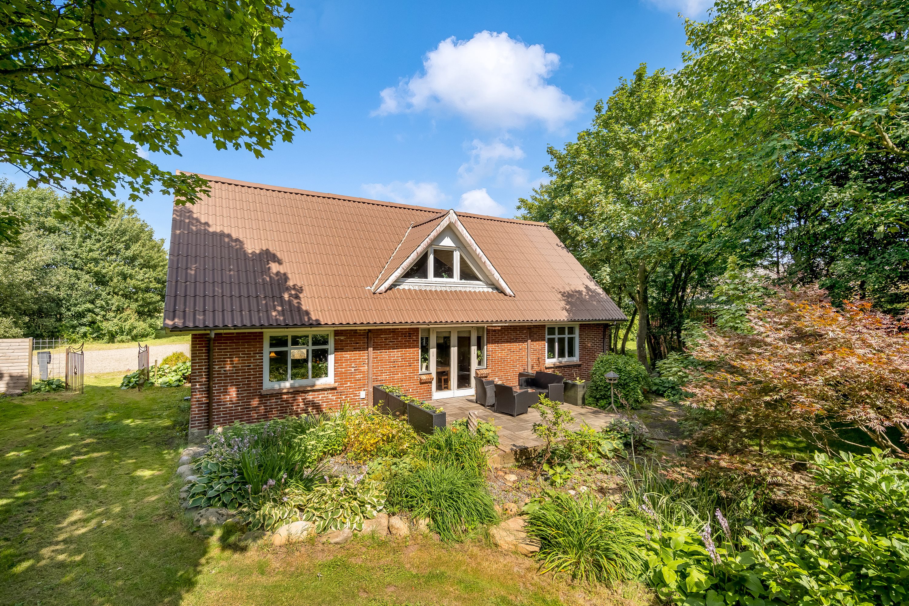 Miniaturebillede 1: facade. Billede af Brejningvej 21, Brejning, 6971 Spjald