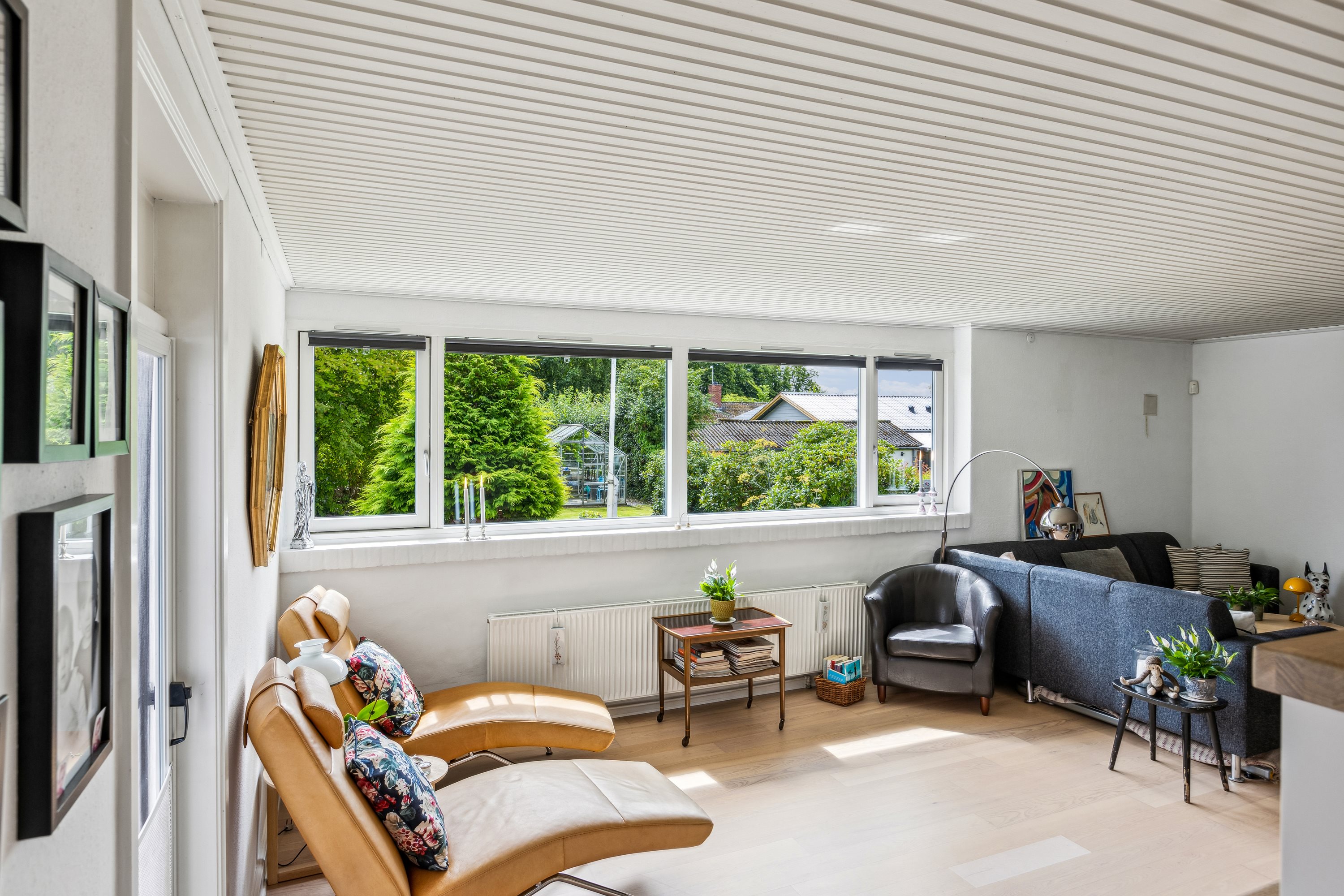 Fremhævet stue billede i fuldskærmstilstand. Billede af Jens Nielsensvej 5, Vester Åby, 5600 Faaborg