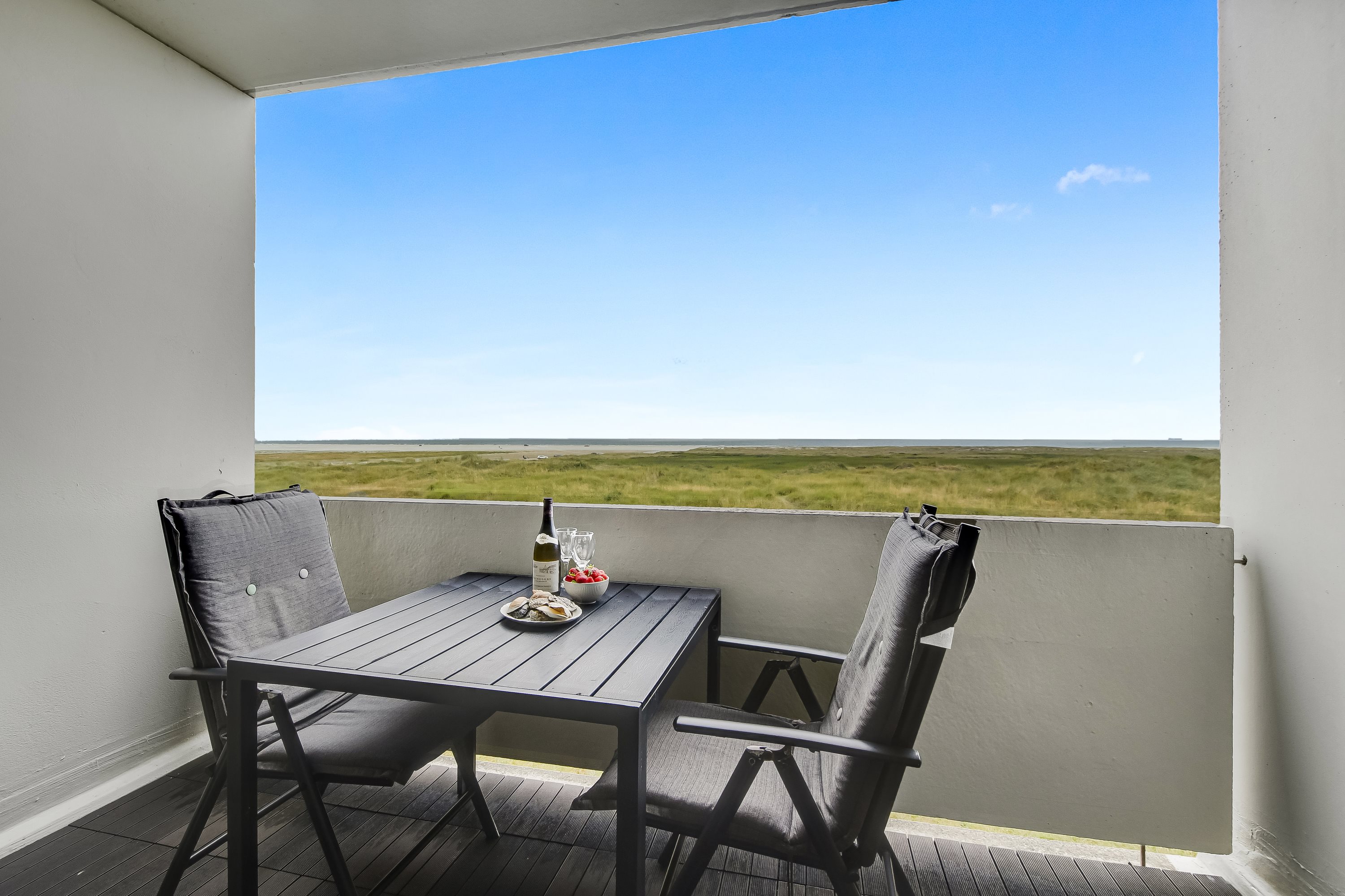 Miniaturebillede 1: terrasse. Billede af Strandvejen 61A, 1. 210., Fanø Bad, 6720 Fanø