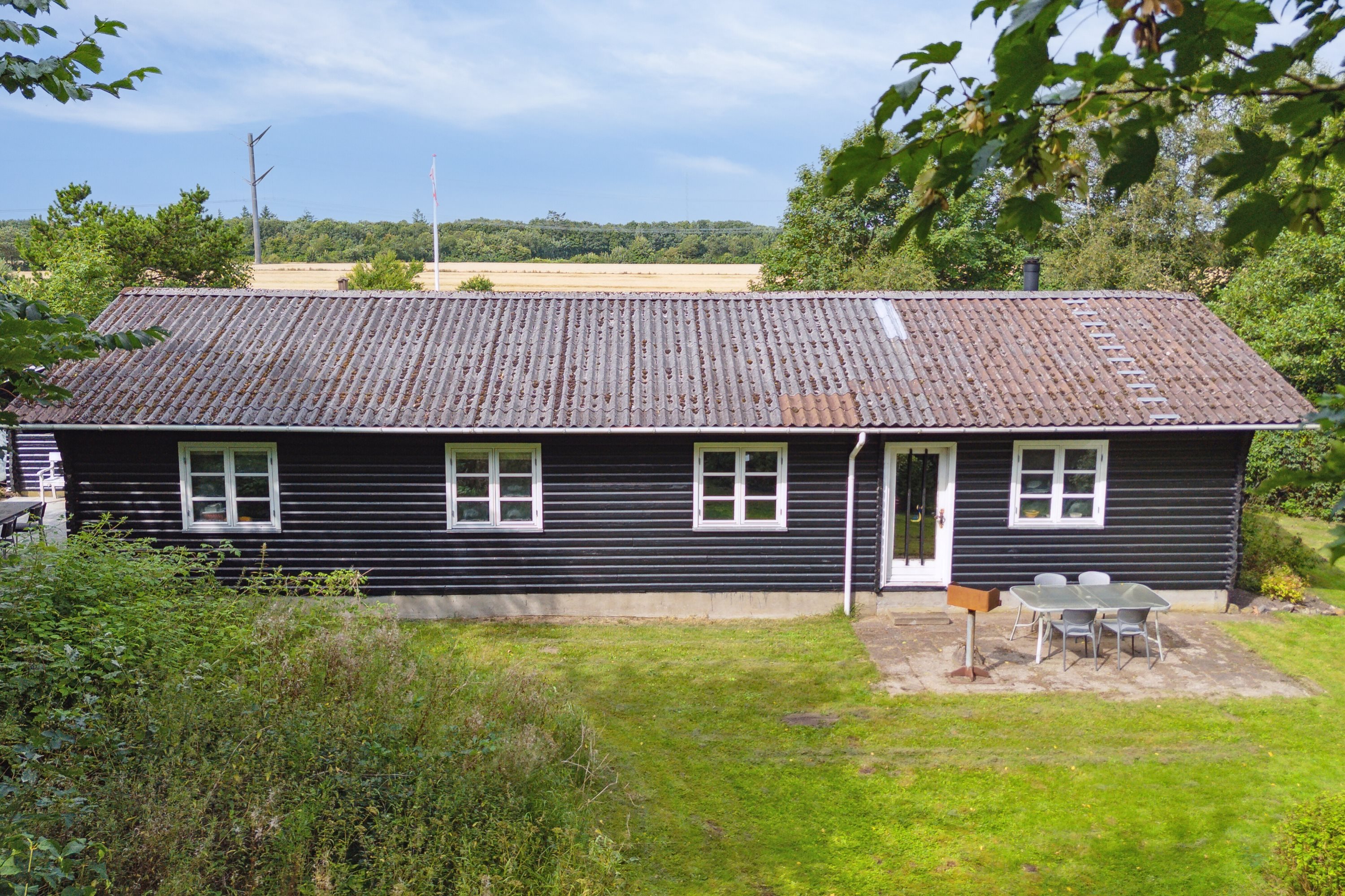 Fremhævet set fra haven billede i fuldskærmstilstand. Billede af Ringkøbingvej 23B, 7441 Bording