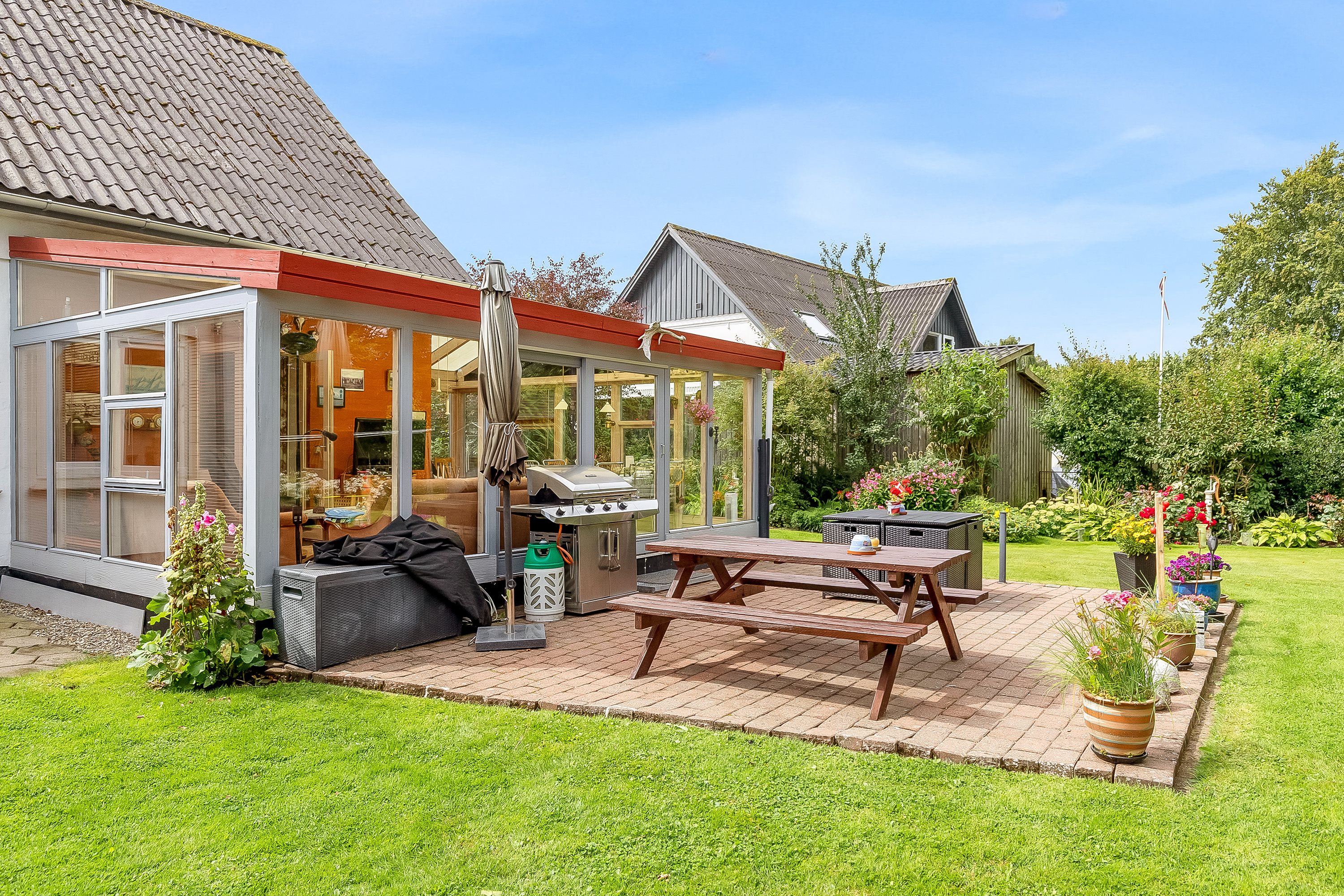 Fremhævet terrasse billede i fuldskærmstilstand. Billede af Fjællebrovej 13, 6093 Sjølund