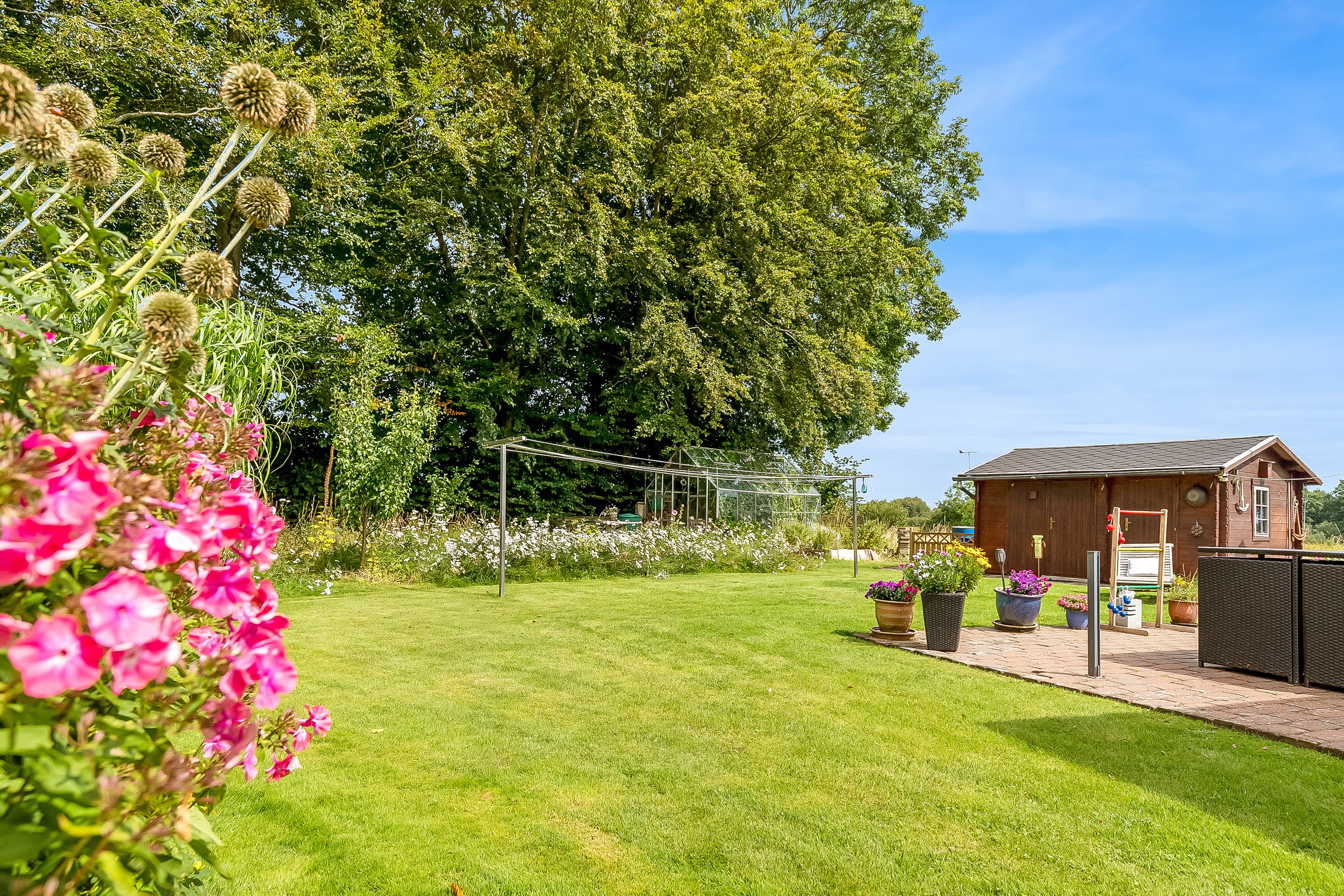 Fremhævet have billede i fuldskærmstilstand. Billede af Fjællebrovej 13, 6093 Sjølund