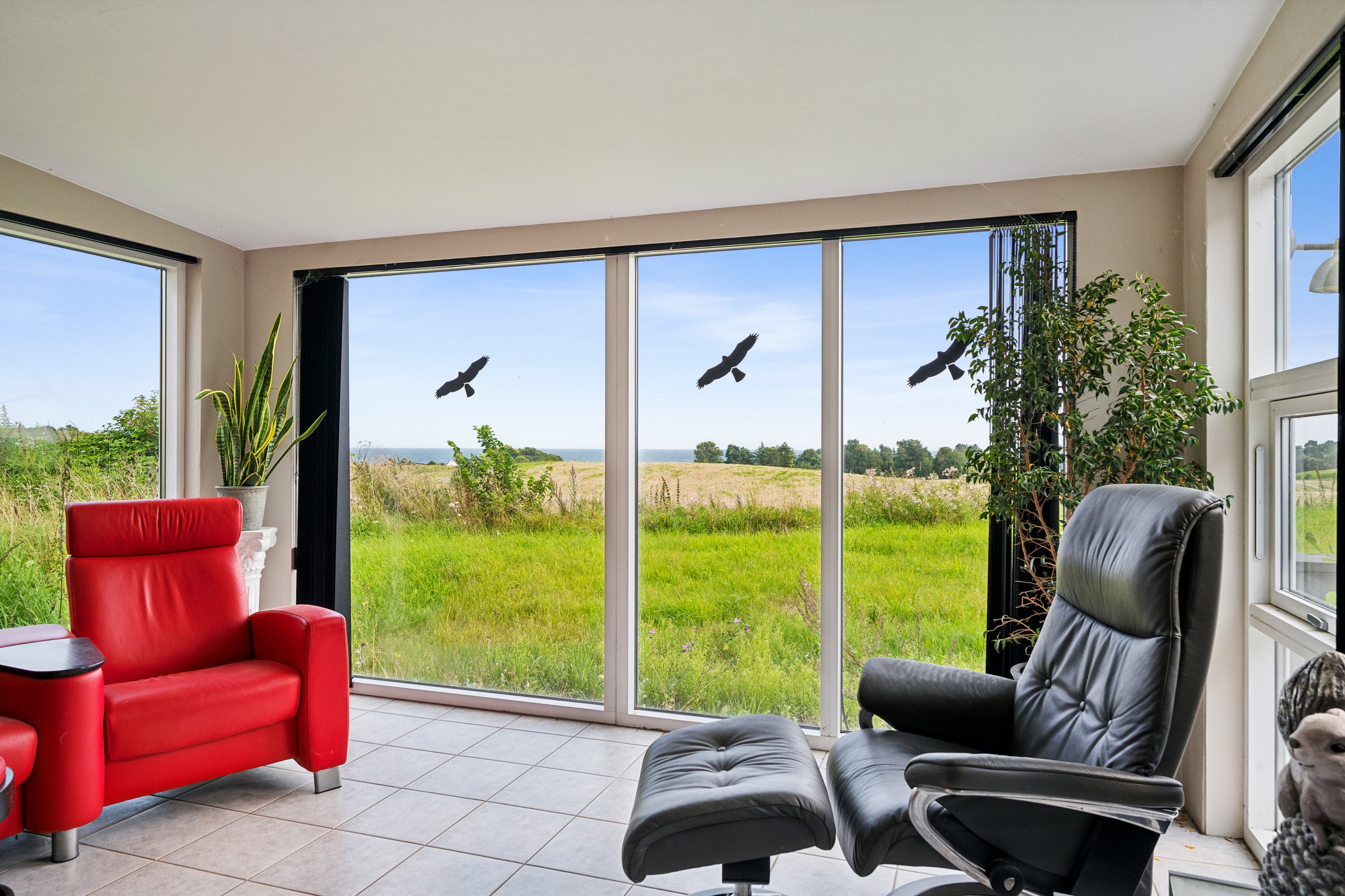 Fremhævet stue billede i fuldskærmstilstand. Billede af Bavnehøjvej 3, Holme, 8400 Ebeltoft