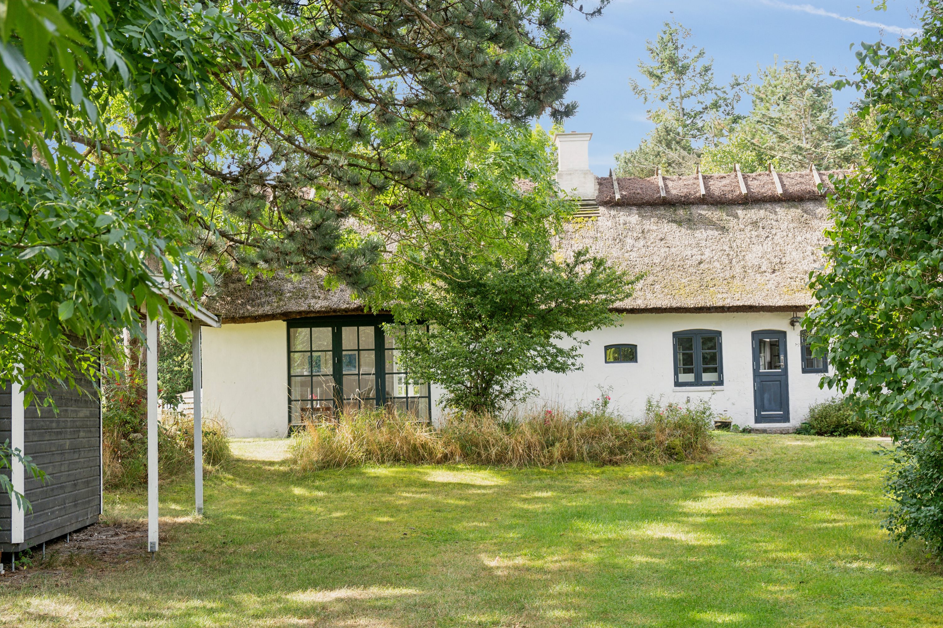 Fremhævet set fra haven billede i fuldskærmstilstand. Billede af Vesterlyngvej 120, 4500 Nykøbing Sj