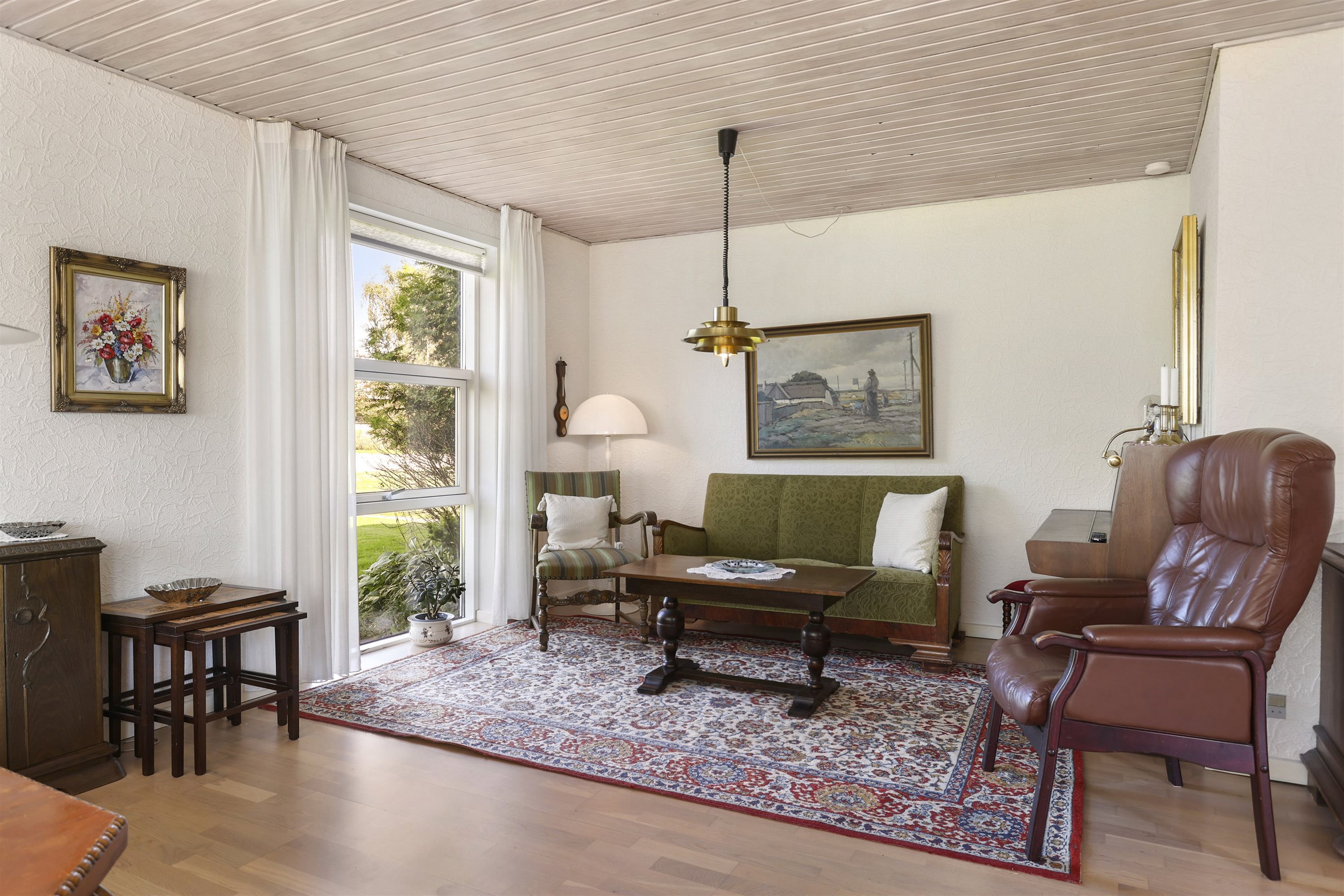 Fremhævet stue billede i fuldskærmstilstand. Billede af Højlundsvej 42, 9750 Østervrå