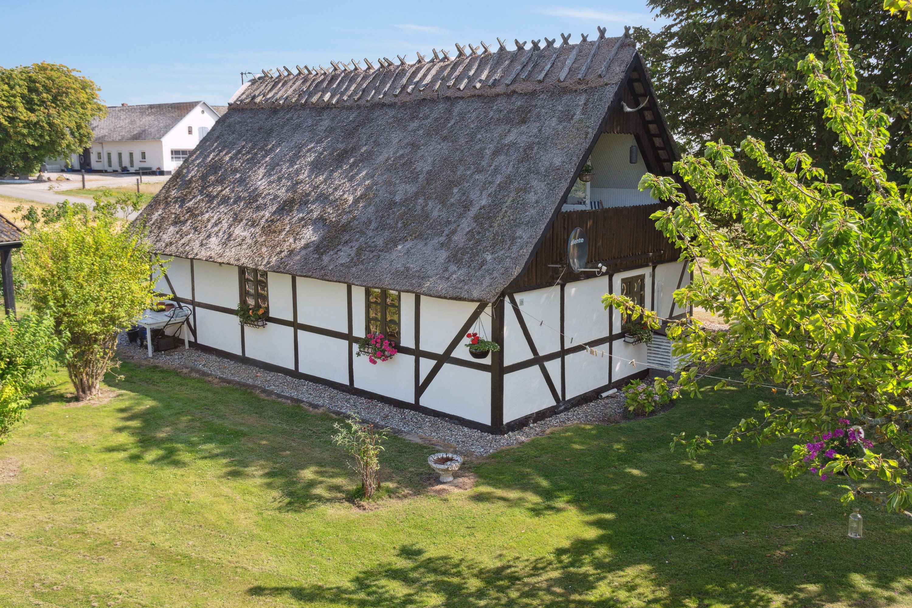 Fremhævet set fra haven billede i fuldskærmstilstand. Billede af Svinøvej 146, 4750 Lundby