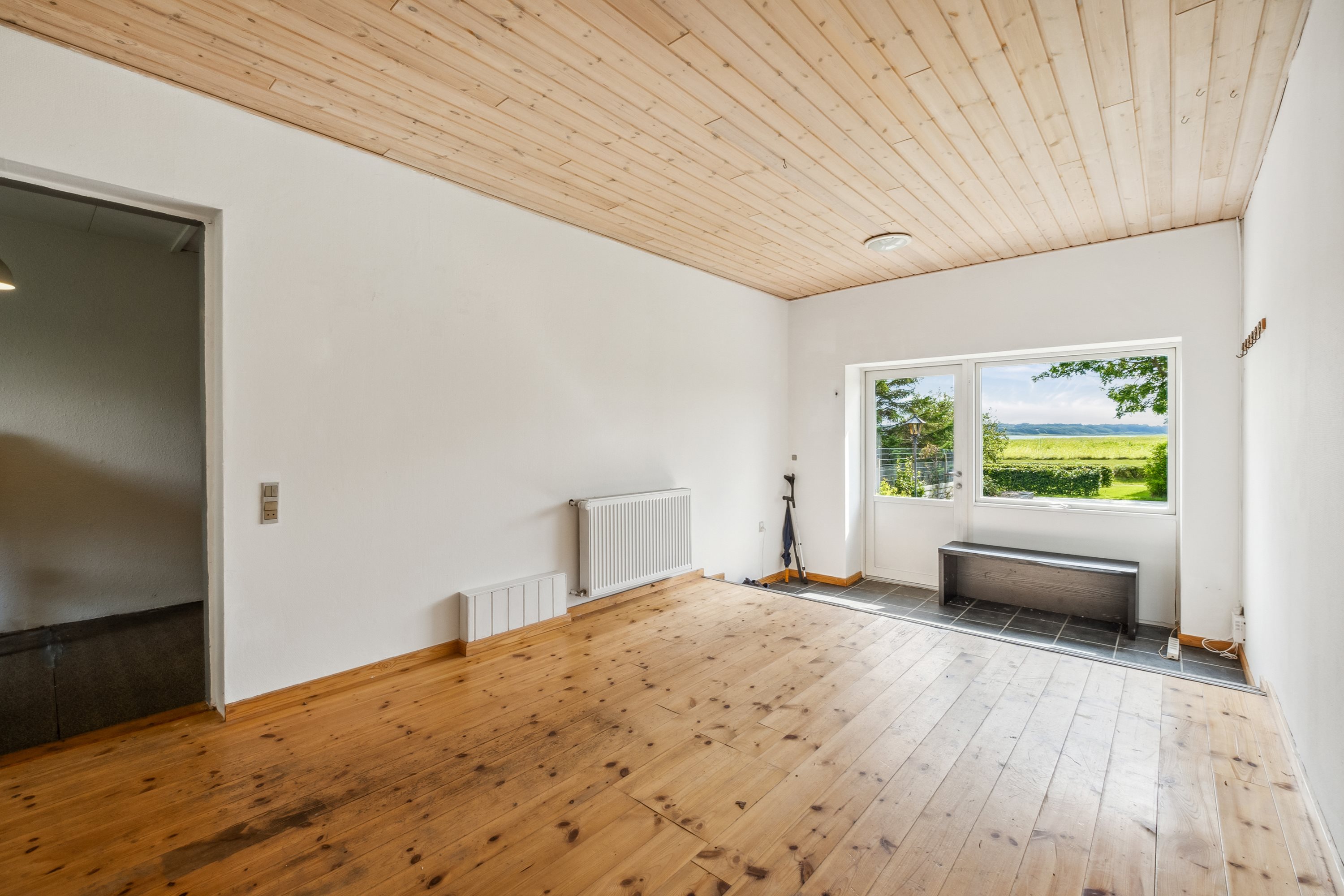 Fremhævet stue billede i fuldskærmstilstand. Billede af Lundøvej 208, Lundø, 7840 Højslev