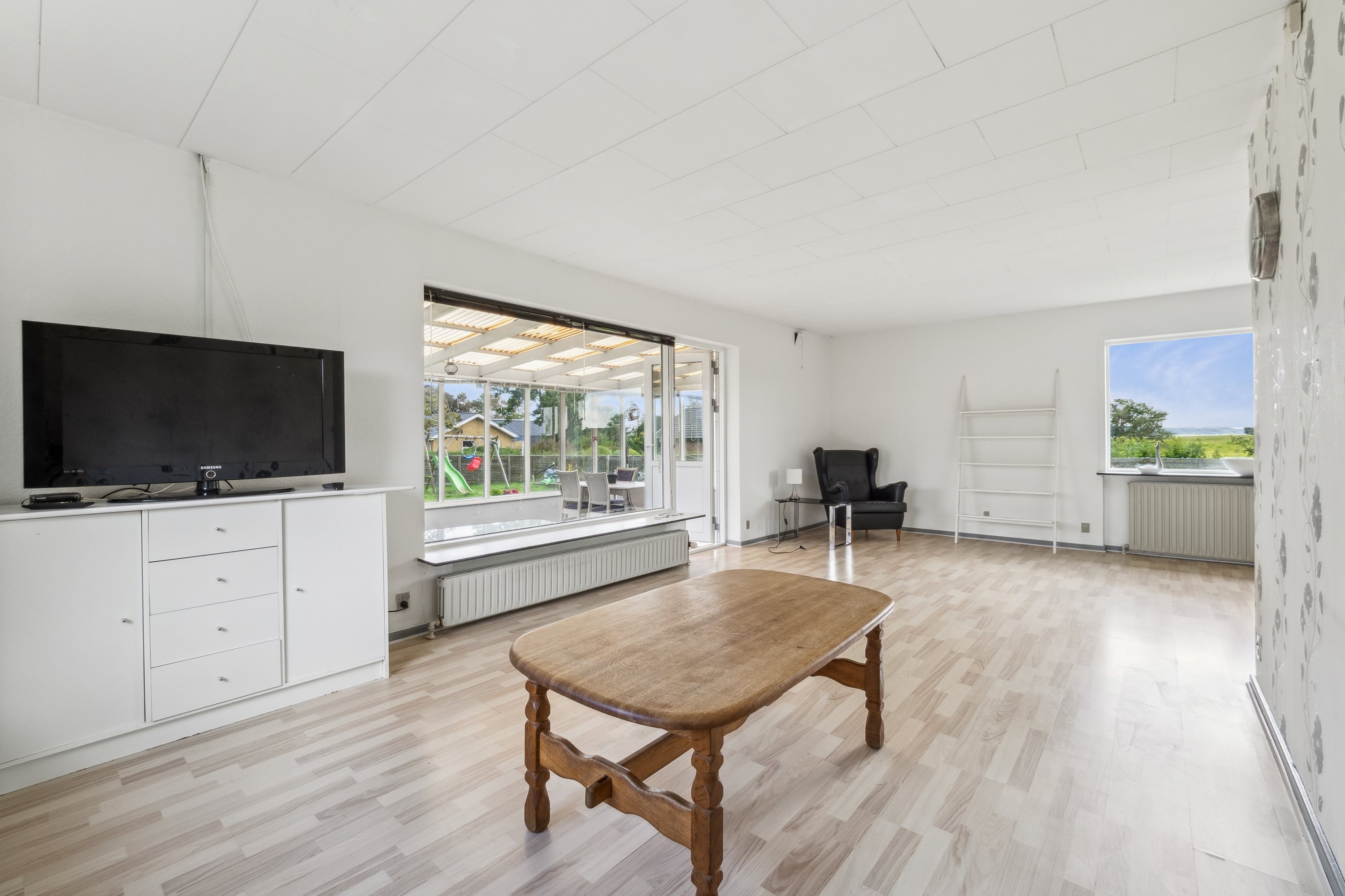 Fremhævet stue billede i fuldskærmstilstand. Billede af Lundøvej 208, Lundø, 7840 Højslev