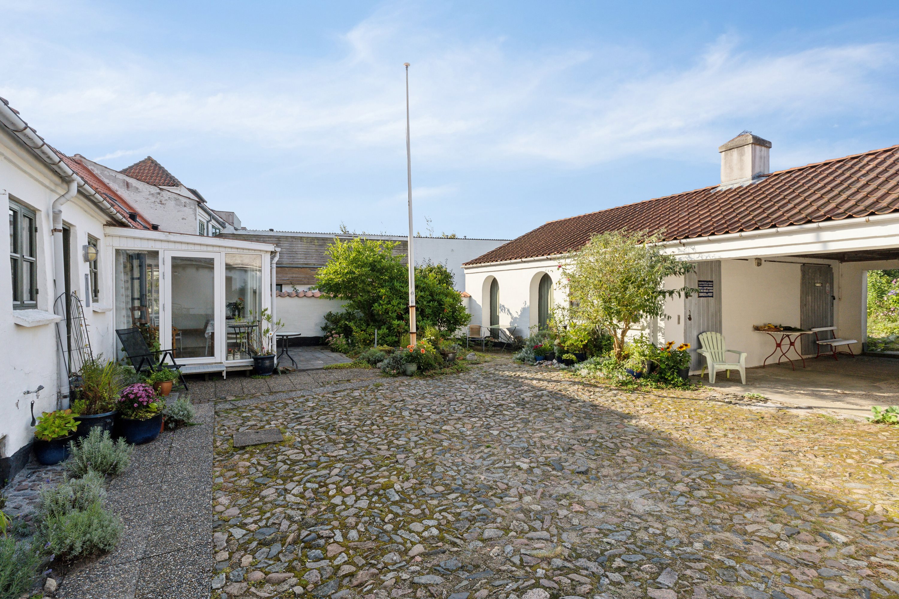 Fremhævet gårdhave billede i fuldskærmstilstand. Billede af Børsen 11, 9800 Hjørring