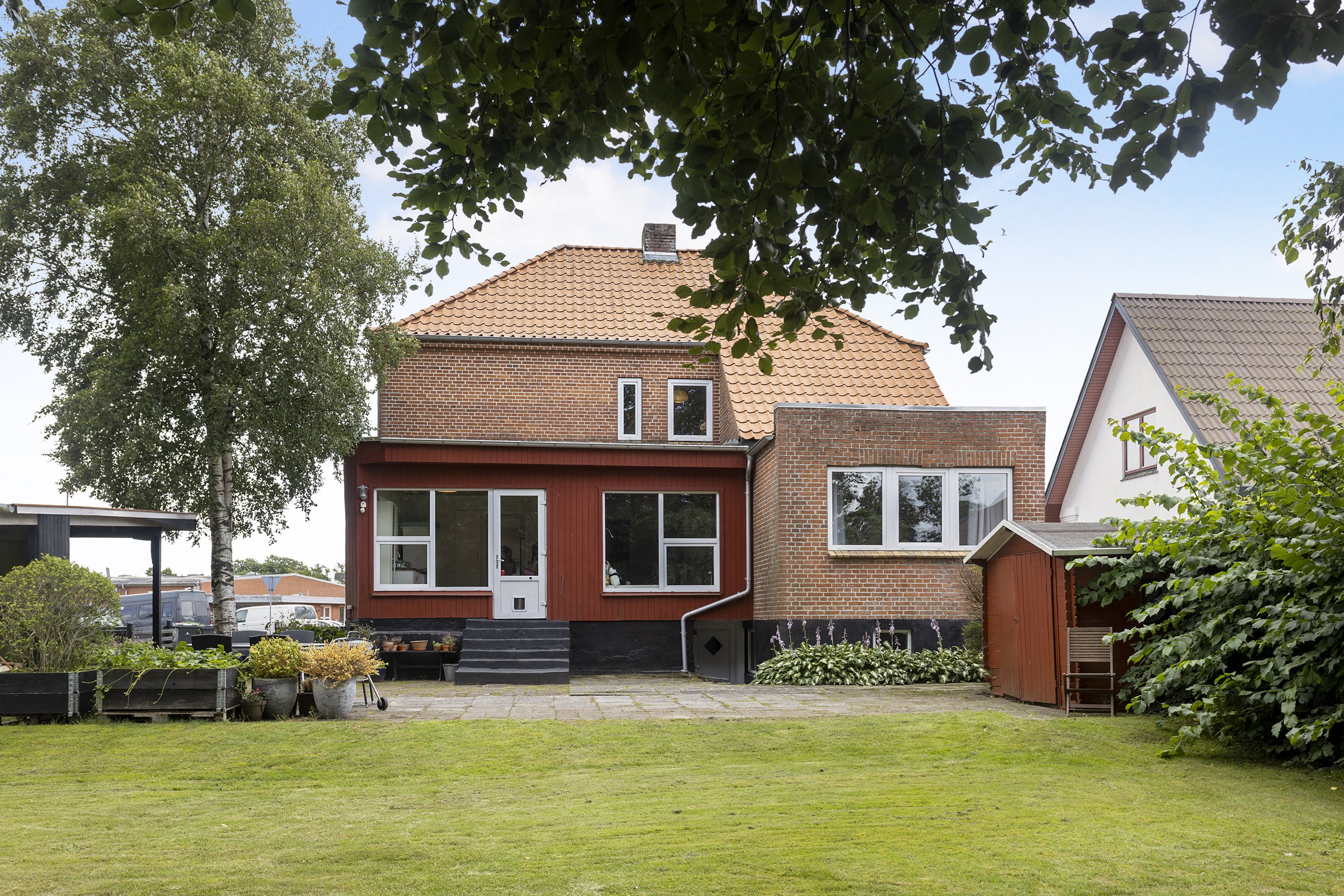 Fremhævet set fra haven billede i fuldskærmstilstand. Billede af Primulavej 11, 9750 Østervrå