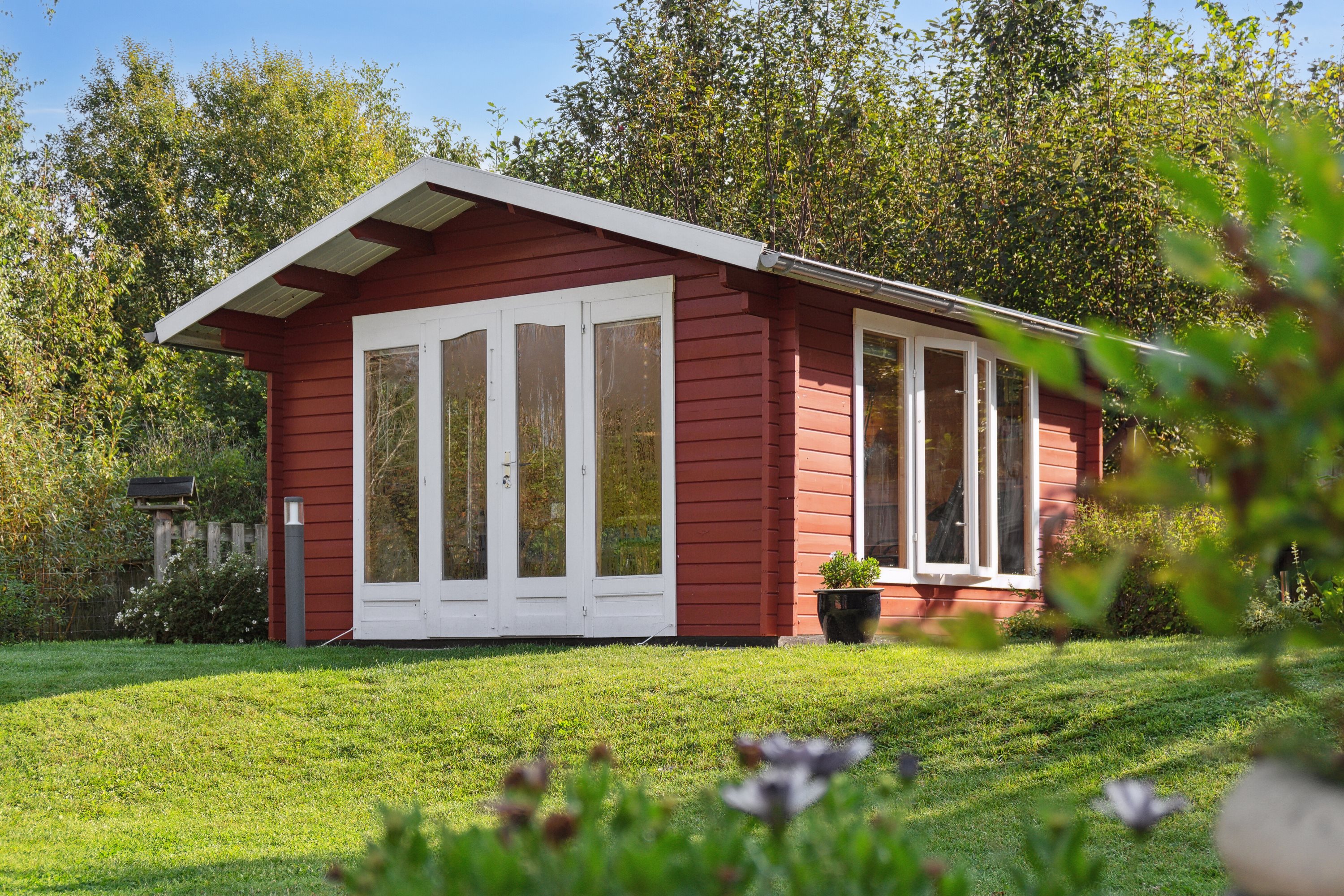 Fremhævet set fra haven billede i fuldskærmstilstand. Billede af Teglgårdshaven 14, 9870 Sindal